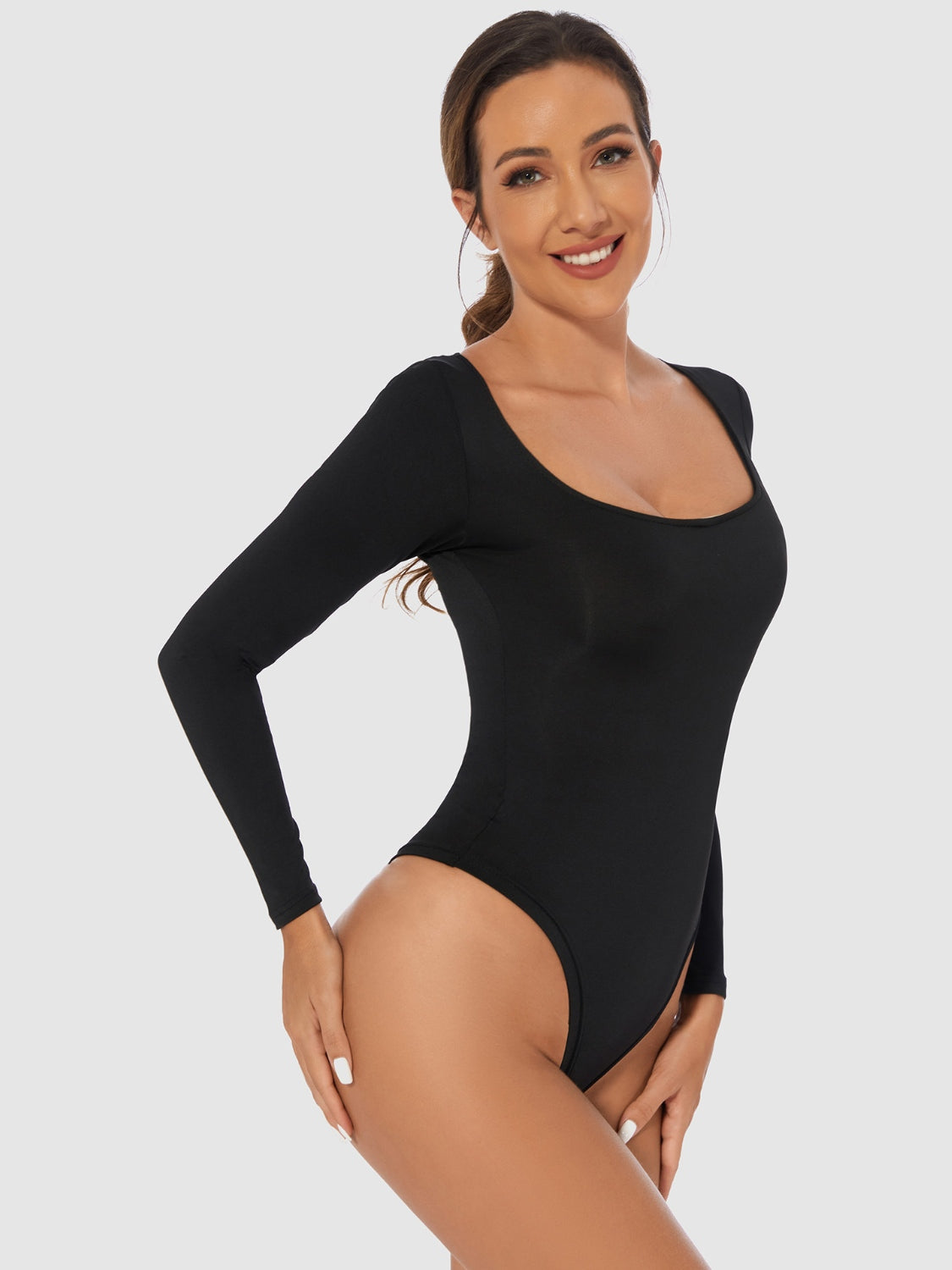 Full Size Scoop Neck Long Sleeve BodysuitFeatures: Basic style
Sheer: Opaque
Stretch: Slightly stretchy
Material composition: 65% polyester, 35% elastane
Care instructions: Machine wash cold. Tumble dry lowFull Size Scoop Neck Long Sleeve BodysuitFull Size Scoop Neck Long Sleeve Bodysuit