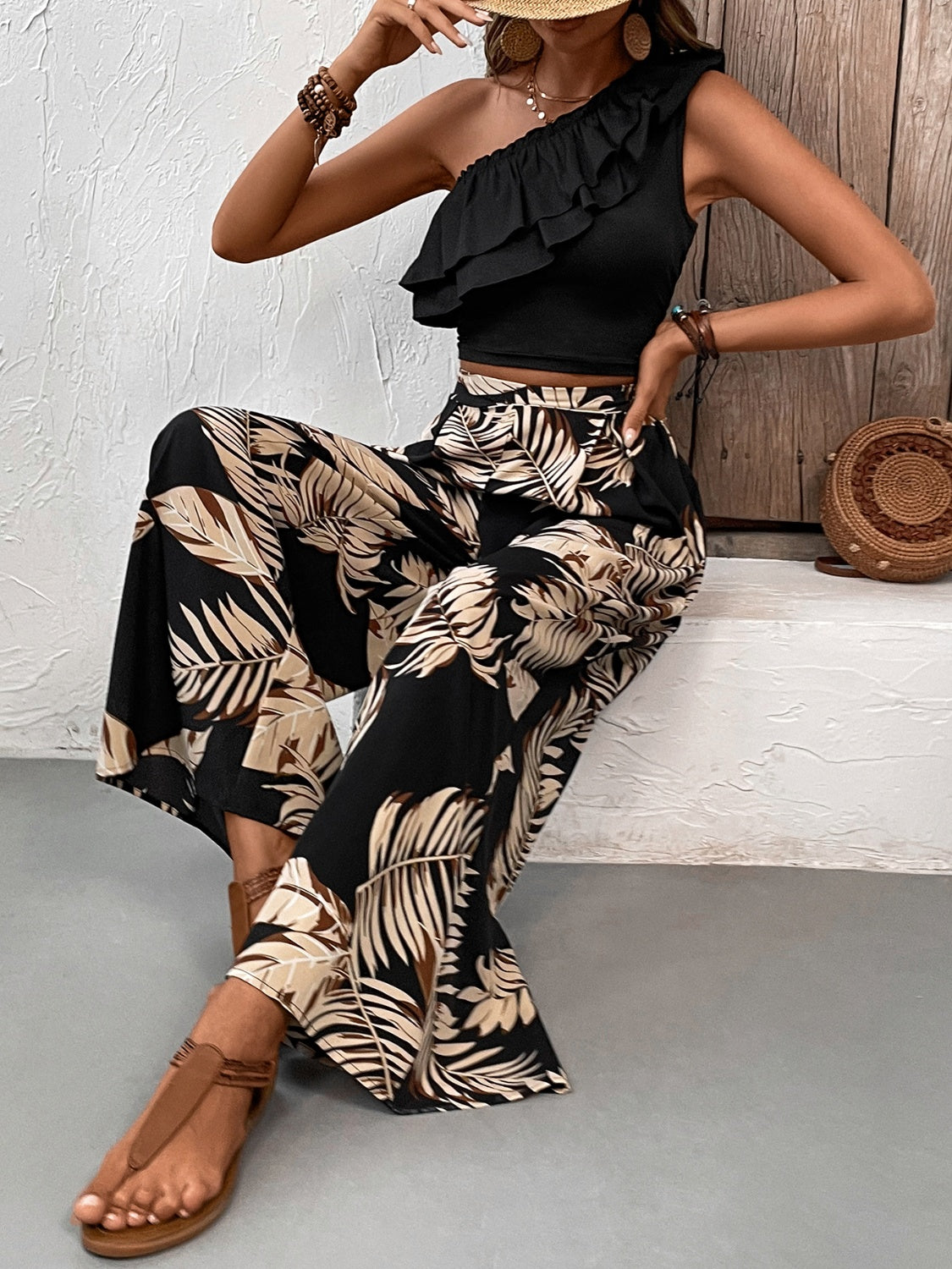 Honey Ruffled Sleeveless Top and Printed Pants SetFeatures: Ruffled
Number of pieces: Two-piece
Stretch: No stretch
Material composition: 95% polyester, 5% elastane
Care instructions: Machine wash cold. Tumble dry lHoney Ruffled Sleeveless TopDressesHoney Ruffled Sleeveless Top