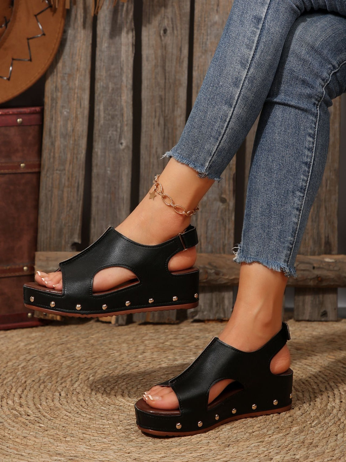 PU Leather Studded Wedge SandalsIncludes: Box not included
Heel height: Flats
Material: Rubber, PU
Imported
Product Measurements (Measurements by inches) &amp; Size Conversion

Size
Foot length


3PU Leather Studded Wedge SandalsPU Leather Studded Wedge Sandals