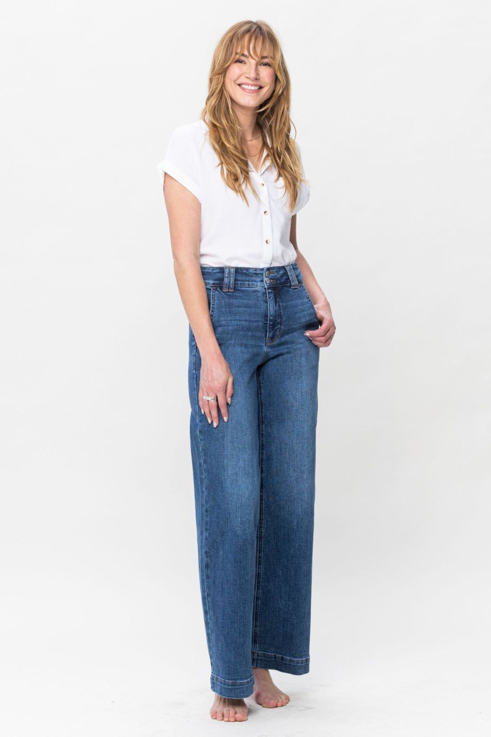 Judy Blue Full Size Double Button Wide Leg JeansHigh Rise Double button wide leg jeans are stylish wide leg jeans with a unique design and two buttons to add personality. Its loose pant leg cut, is comfortable andJudy Blue Full Size Double Button Wide Leg JeansJudy Blue Full Size Double Button Wide Leg Jeans