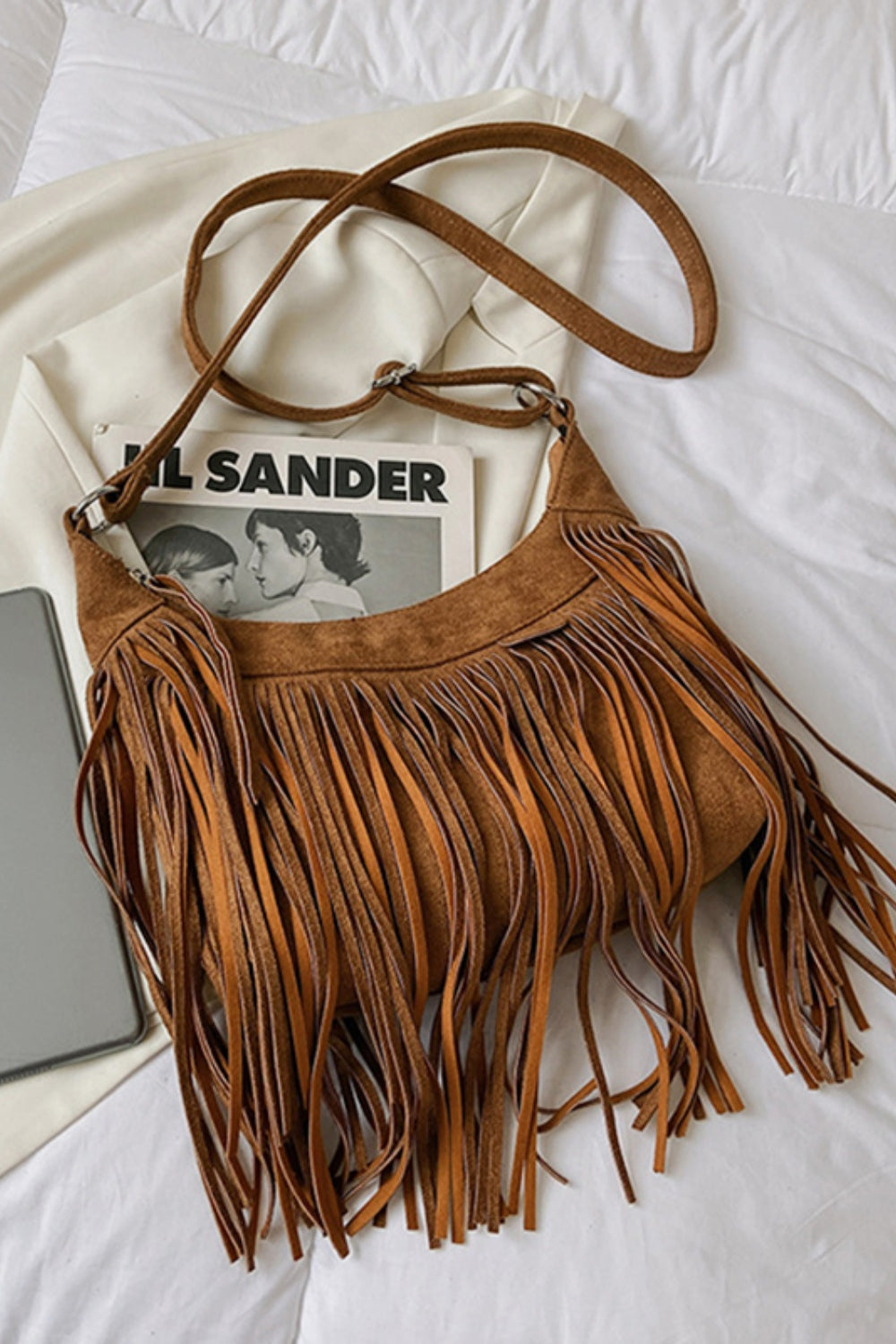 Suede Fringe Adjustable Strap Shoulder BagBag size: Small
Material: Suede
Imported
Product measurements:
Length 9.8 in, Width 3.1 in, Height 7.1 in, Weight 15.9 ozbag strapbag strap