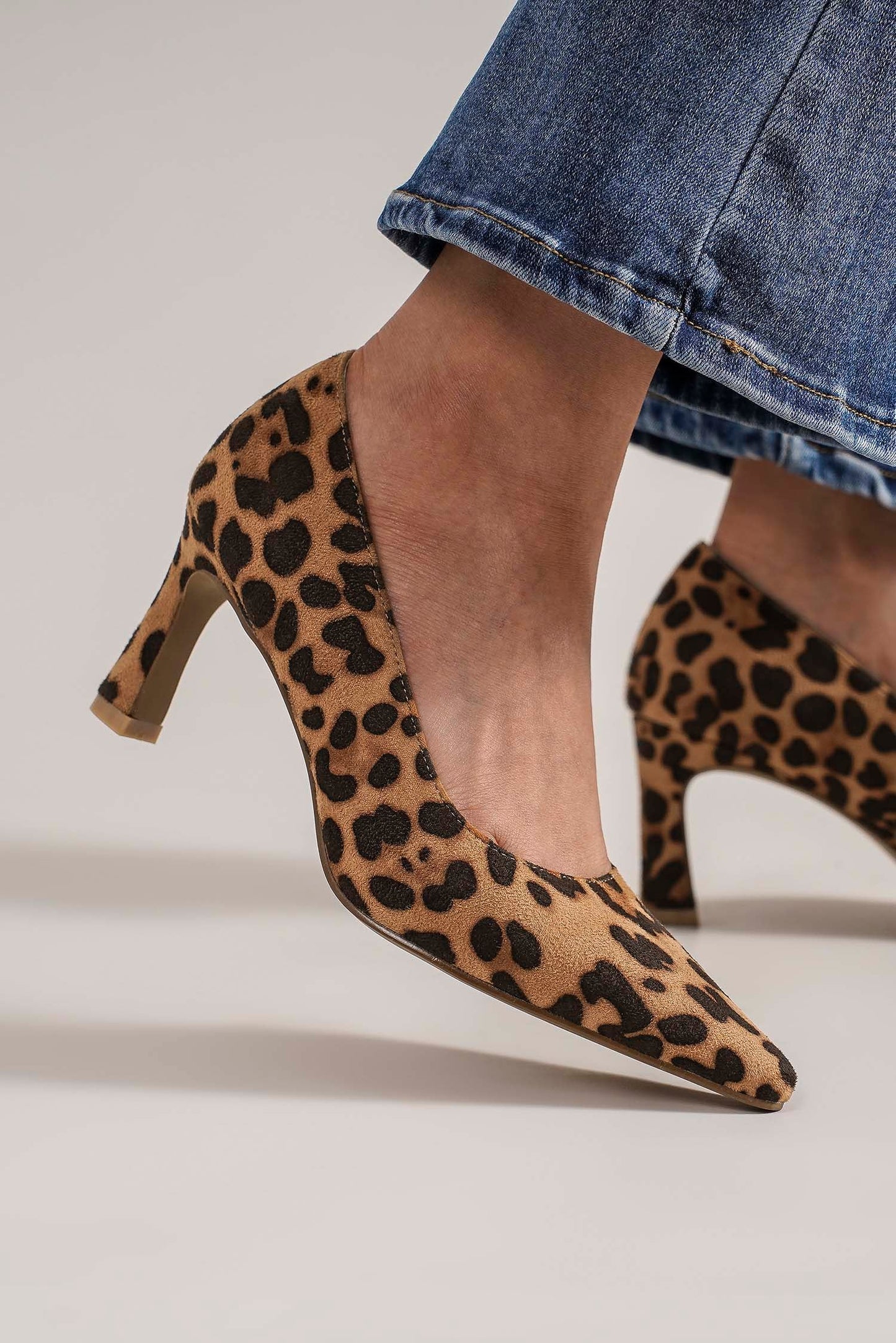 Beast Fashion Faux Suede Leopard Point Toe PumpsFaux Suede Leopard Point Toe Pumps are a fierce and stylish footwear choice. These pumps feature a faux suede material with a leopard print design, adding a bold andBeast Fashion Faux Suede Leopard Point Toe PumpsBeast Fashion Faux Suede Leopard Point Toe Pumps