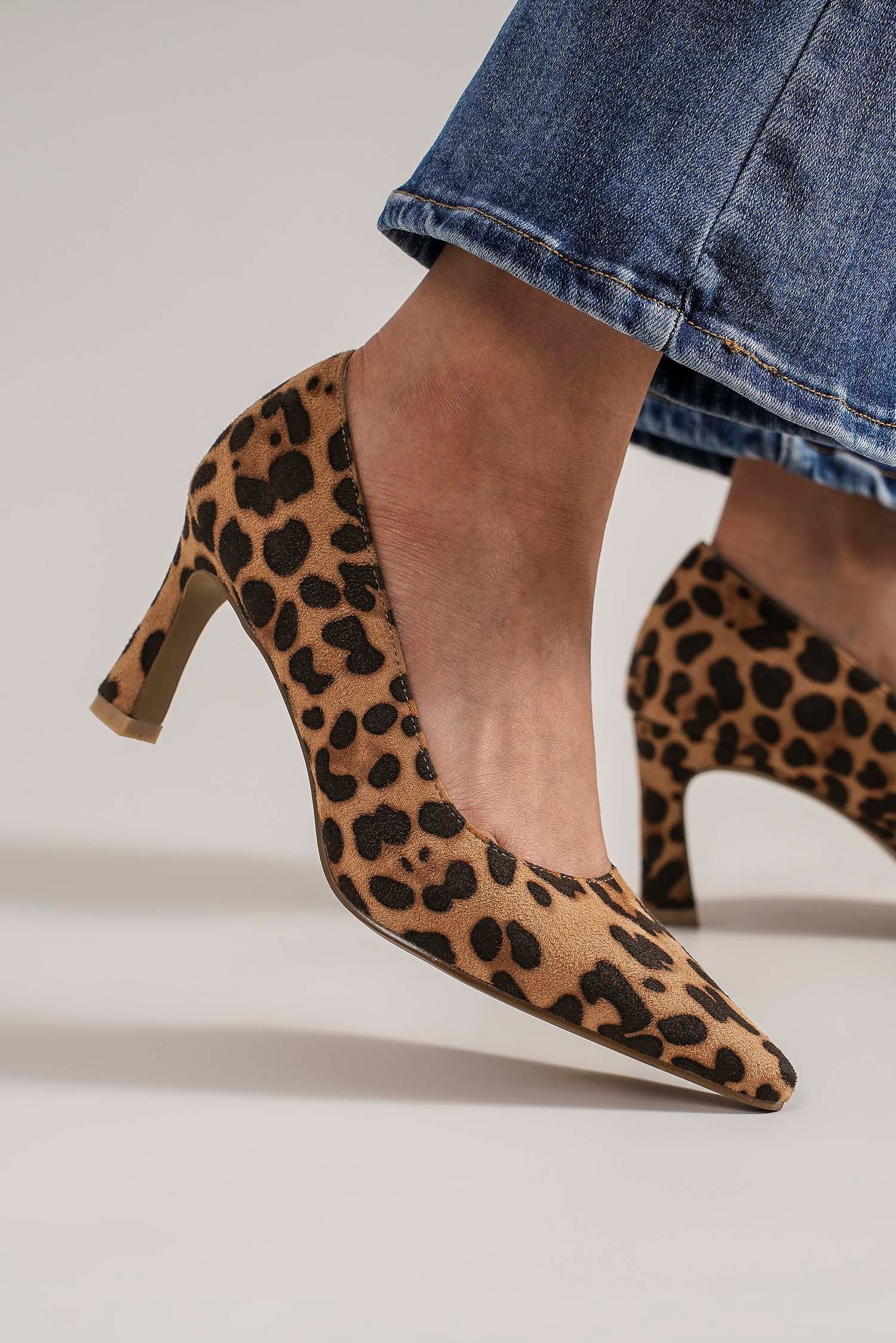 Beast Fashion Faux Suede Leopard Point Toe PumpsFaux Suede Leopard Point Toe Pumps are a fierce and stylish footwear choice. These pumps feature a faux suede material with a leopard print design, adding a bold andBeast Fashion Faux Suede Leopard Point Toe PumpsBeast Fashion Faux Suede Leopard Point Toe Pumps