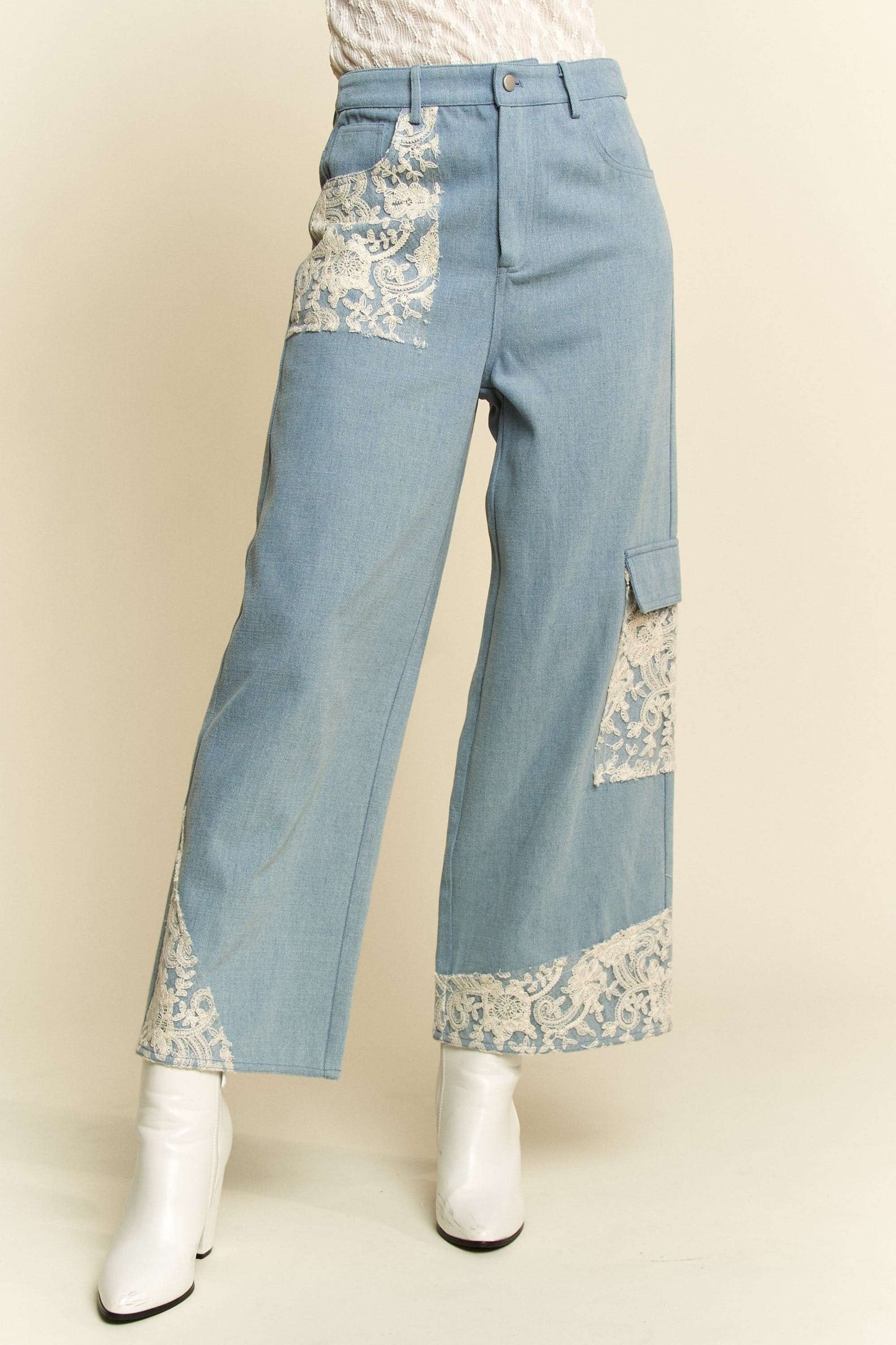 Davi & Dani Lace Applique Wide Leg JeansThese Lace Applique Wide Leg Jeans are the perfect statement piece for any fashion-forward individual. The delicate lace detailing adds a touch of femininity to thesDavi & Dani Lace Applique Wide Leg JeansDavi & Dani Lace Applique Wide Leg Jeans