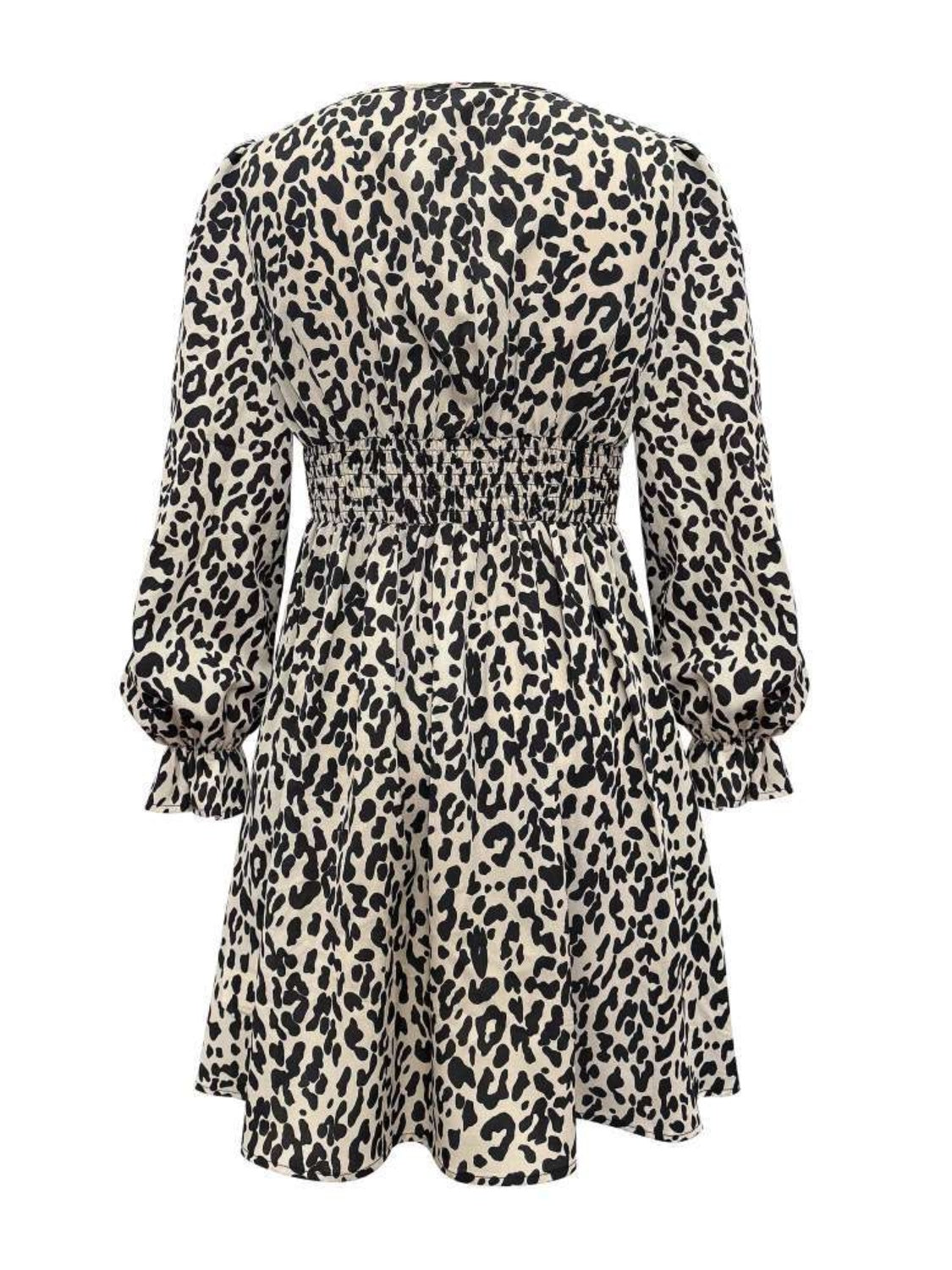 Leopard V-Neck Flounce Sleeve DressIndulge in the art of luxury with our Leopard V-Neck Flounce Sleeve Dress. The striking leopard print and chic V-neck design make this dress both sophisticated and d-Neck Flounce Sleeve DressDresses-Neck Flounce Sleeve Dress