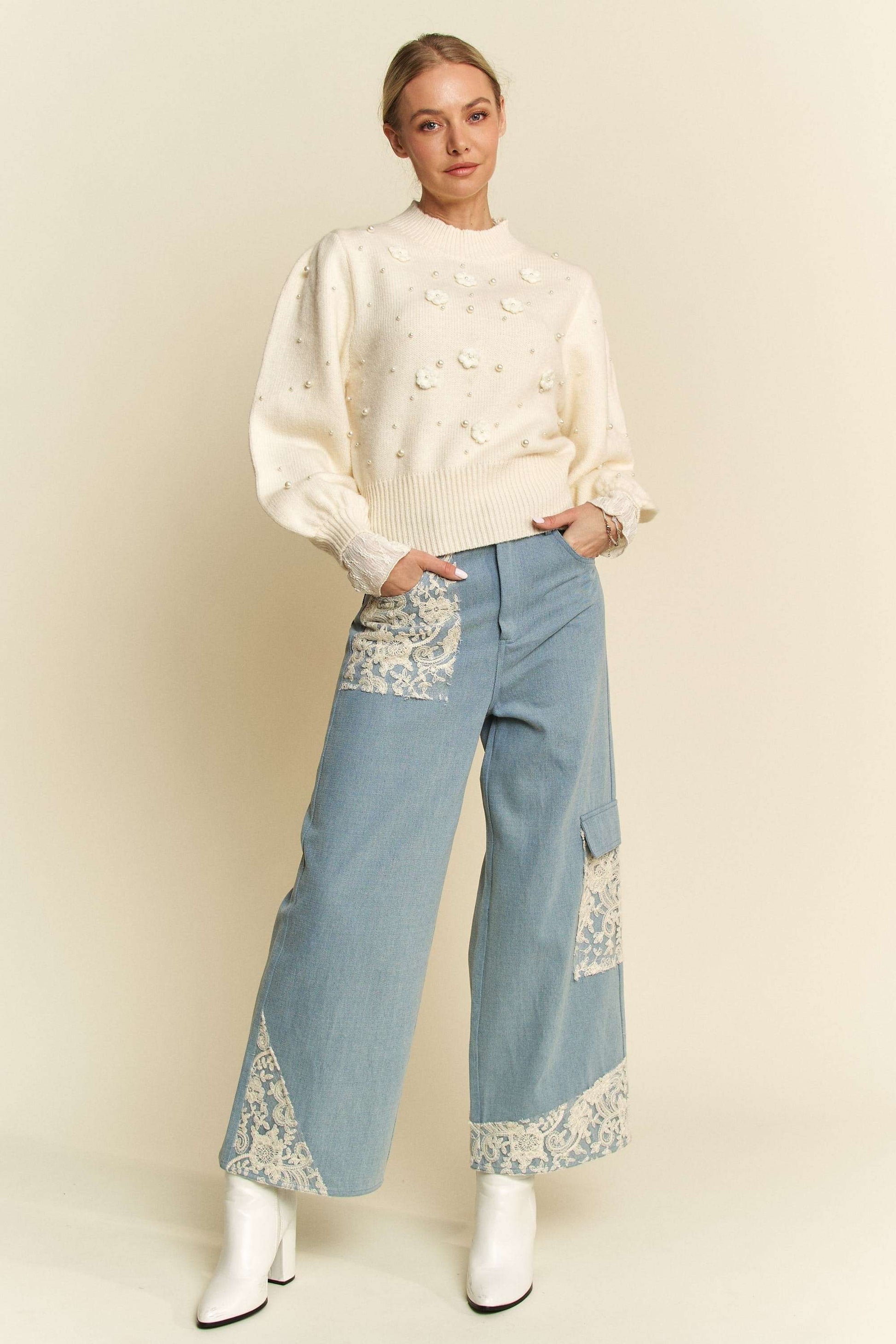 Davi & Dani Lace Applique Wide Leg JeansThese Lace Applique Wide Leg Jeans are the perfect statement piece for any fashion-forward individual. The delicate lace detailing adds a touch of femininity to thesDavi & Dani Lace Applique Wide Leg JeansDavi & Dani Lace Applique Wide Leg Jeans