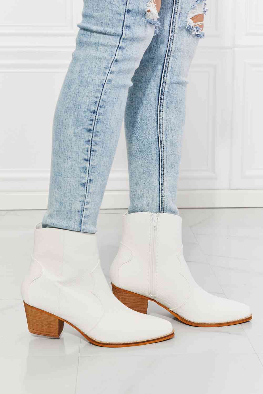 MMShoes Watertower Town Faux Leather Western Ankle Boots in WhiteThese Western-inspired booties feature a stacked heel and a faux leather upper. Their pointed toe adds a refined detail, making these a perfect choice to finish any chelsea boots womenchelsea boots women