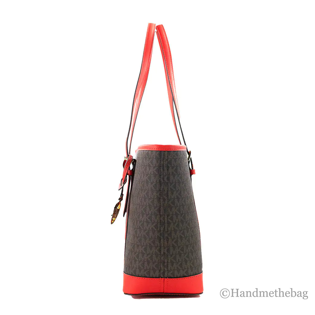 Michael Kors Jet Set Sangria Shoulder Tote PurseMichael Kors Jet Set Shoulder Tote Purse – SangriaBrighten your style with the Michael Kors Jet Set Shoulder Tote Purse in Sangria. This chic tote features a spaciouMichael Kors Jet Set Sangria Shoulder Tote PurseMichael Kors Jet Set Sangria Shoulder Tote Purse