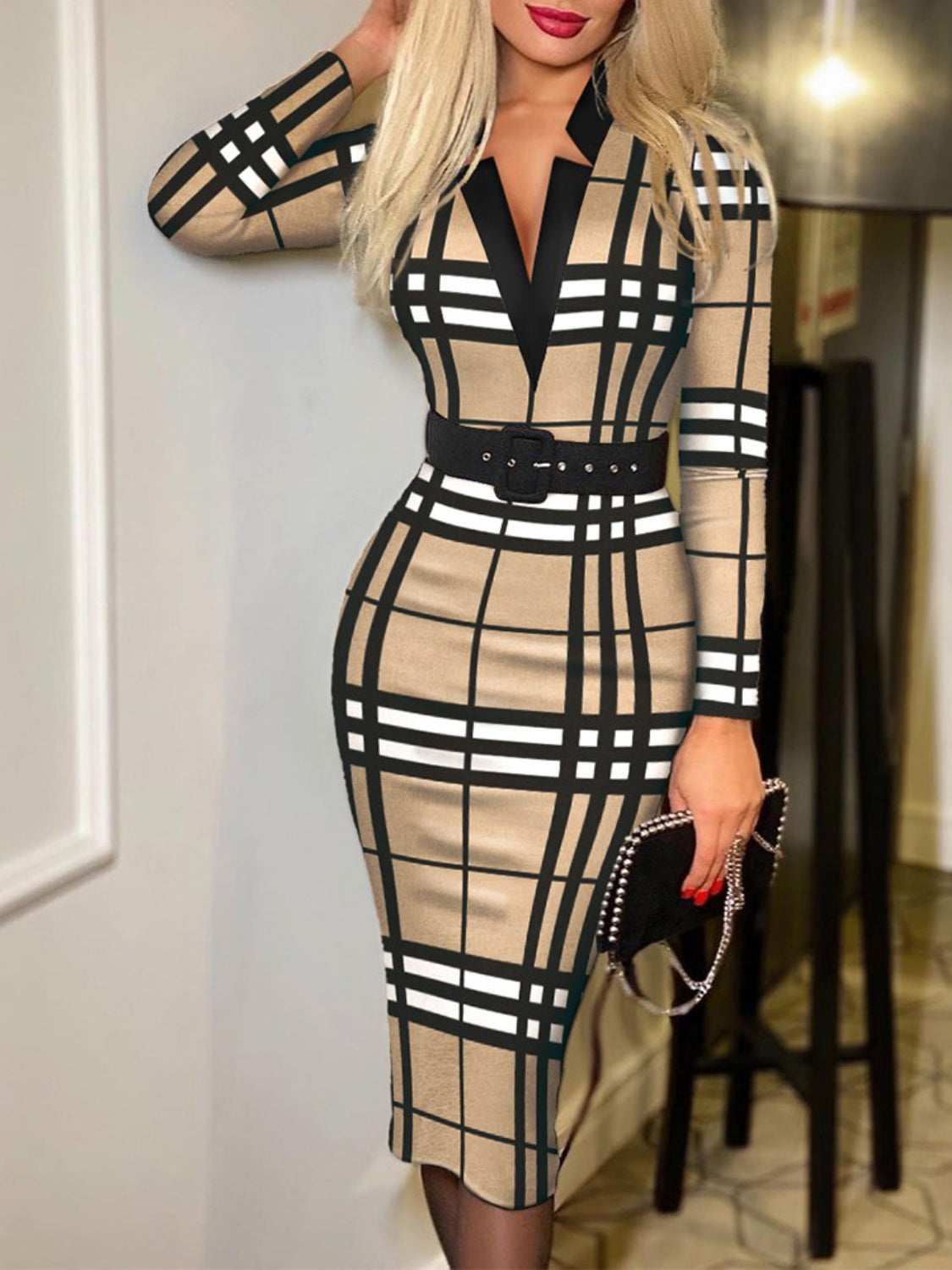 Printed Notched Long Sleeve Wrap DressFeatures: Basic style
Includes: Belted
Sheer: Opaque
Stretch: No stretch
Body: Not lined
Material composition: 100% polyester
Care instructions: Machine wash cold. TPrinted Notched Long Sleeve Wrap DressPrinted Notched Long Sleeve Wrap Dress