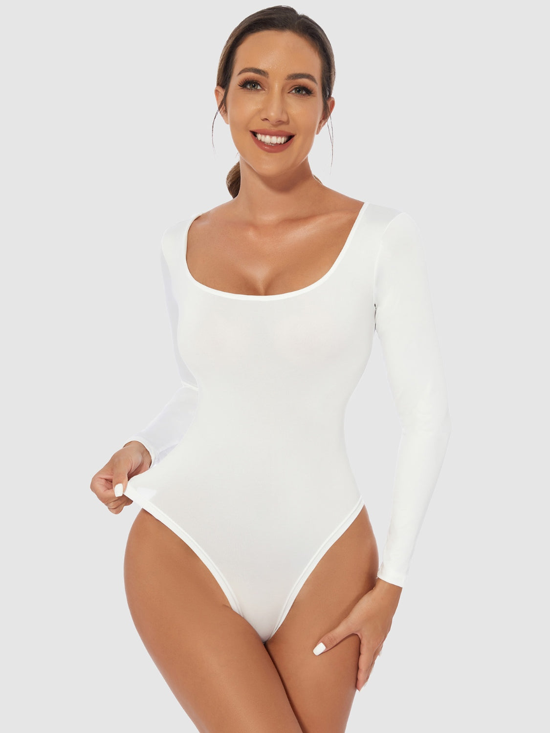 Full Size Scoop Neck Long Sleeve BodysuitFeatures: Basic style
Sheer: Opaque
Stretch: Slightly stretchy
Material composition: 65% polyester, 35% elastane
Care instructions: Machine wash cold. Tumble dry lowFull Size Scoop Neck Long Sleeve BodysuitFull Size Scoop Neck Long Sleeve Bodysuit