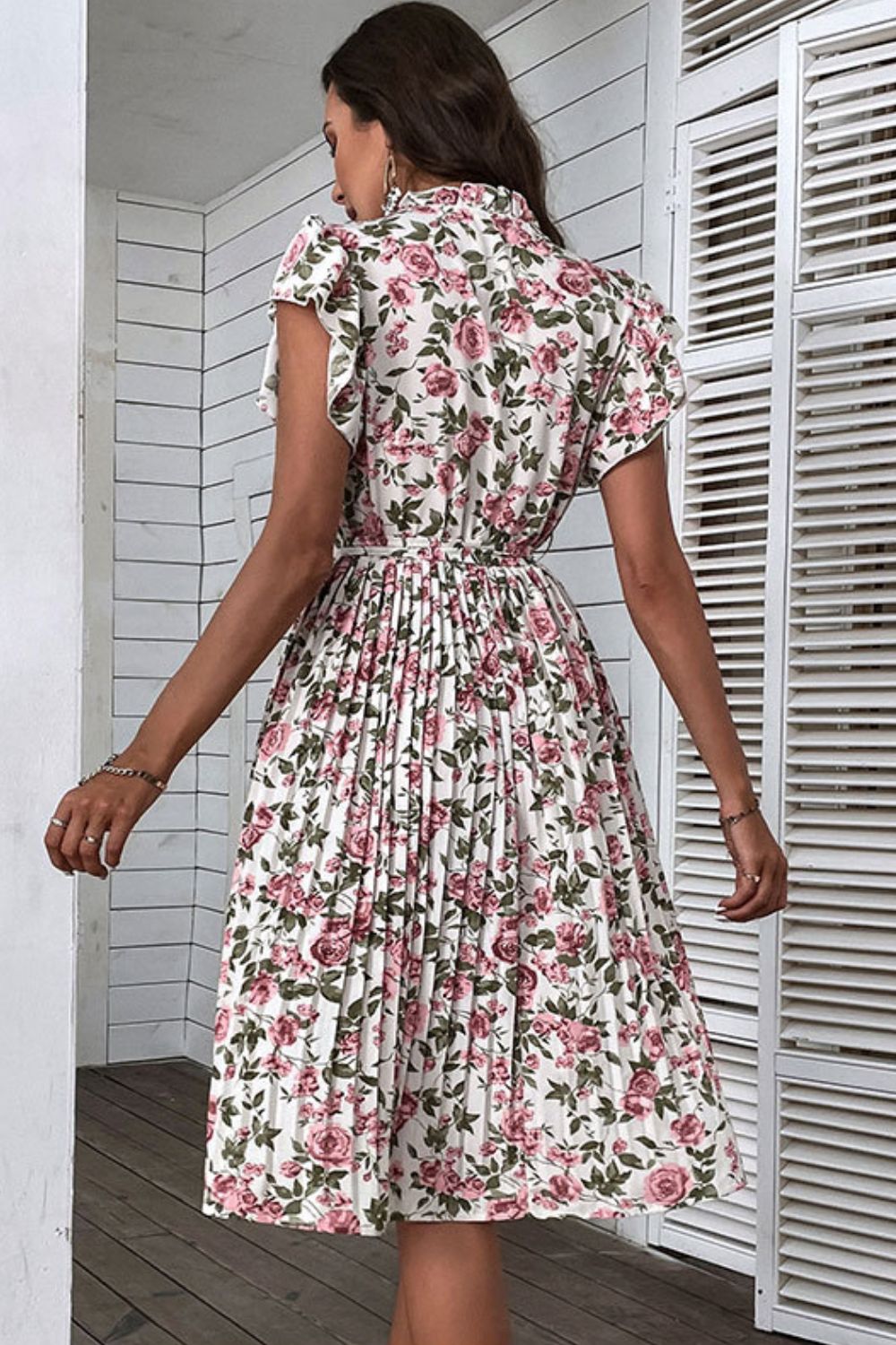 Perfee Floral Tie-Neck Flutter Sleeve Midi DressPattern: Floral
Features: Pleated, tie-waist, flutter sleeves
Neckline: Tie-neck
Stretch: No stretch
Product measurements:
S: bust 37 in, length 42 in, shoulder 14 iPerfee Floral Tie-Neck Flutter Sleeve Midi DressPerfee Floral Tie-Neck Flutter Sleeve Midi Dress