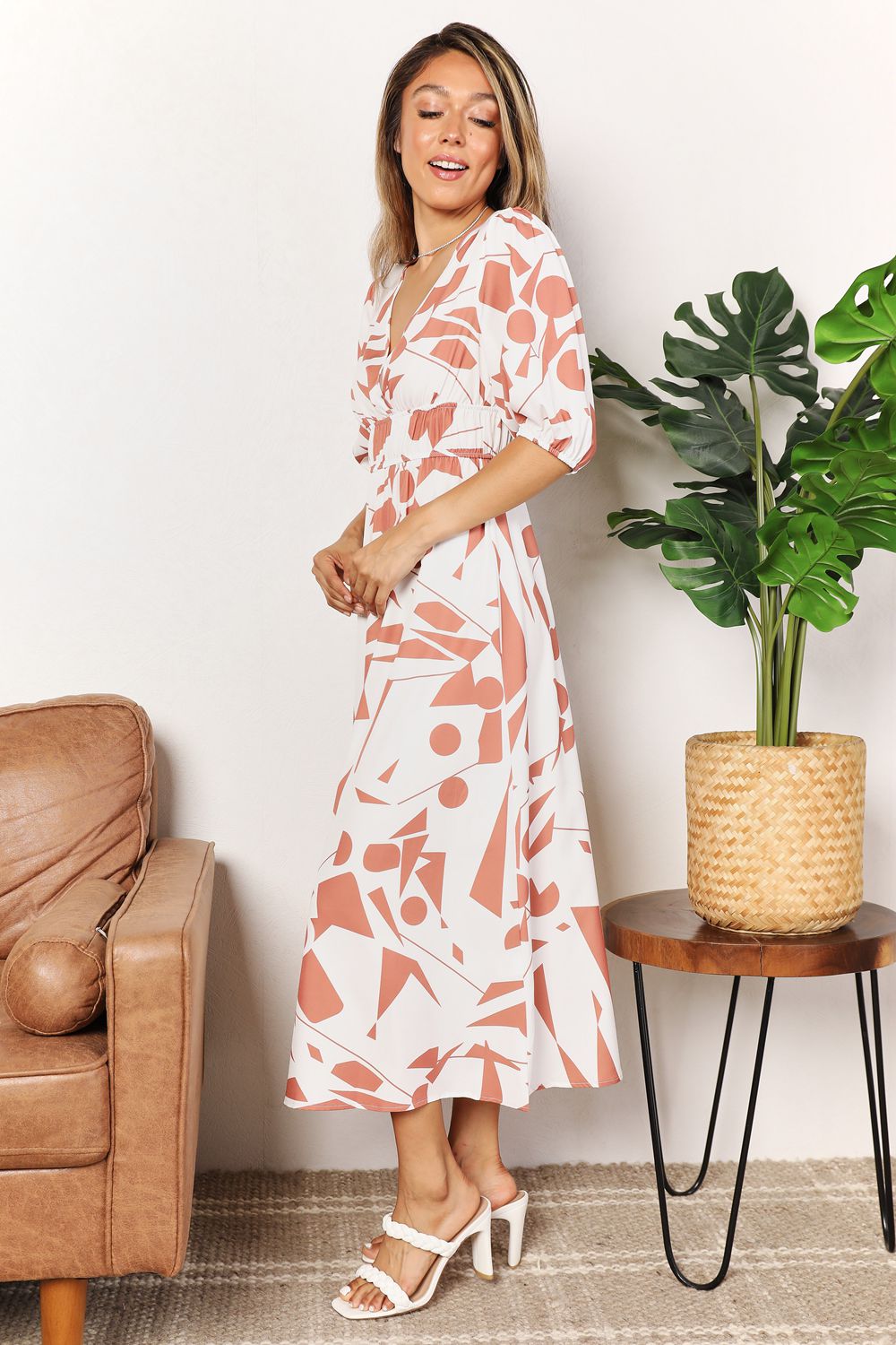 Printed Surplice Balloon Sleeve DressThis printed dress features a surplice neckline for an elegant and flattering look. The balloon sleeves add a touch of whimsy and playfulness to the dress. With its Printed Surplice Balloon Sleeve DressDressesPrinted Surplice Balloon Sleeve Dress