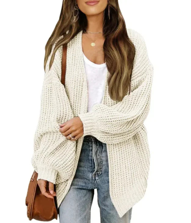 Loose Retro Sweater Coat Women's Mid-length Knitted CardiganCozy up in style with our Loose Retro Sweater Coat! Designed for modern women who love a touch of vintage flair, this mid-length knitted cardigan combines comfort anLoose Retro Sweater Coat Women'Loose Retro Sweater Coat Women'