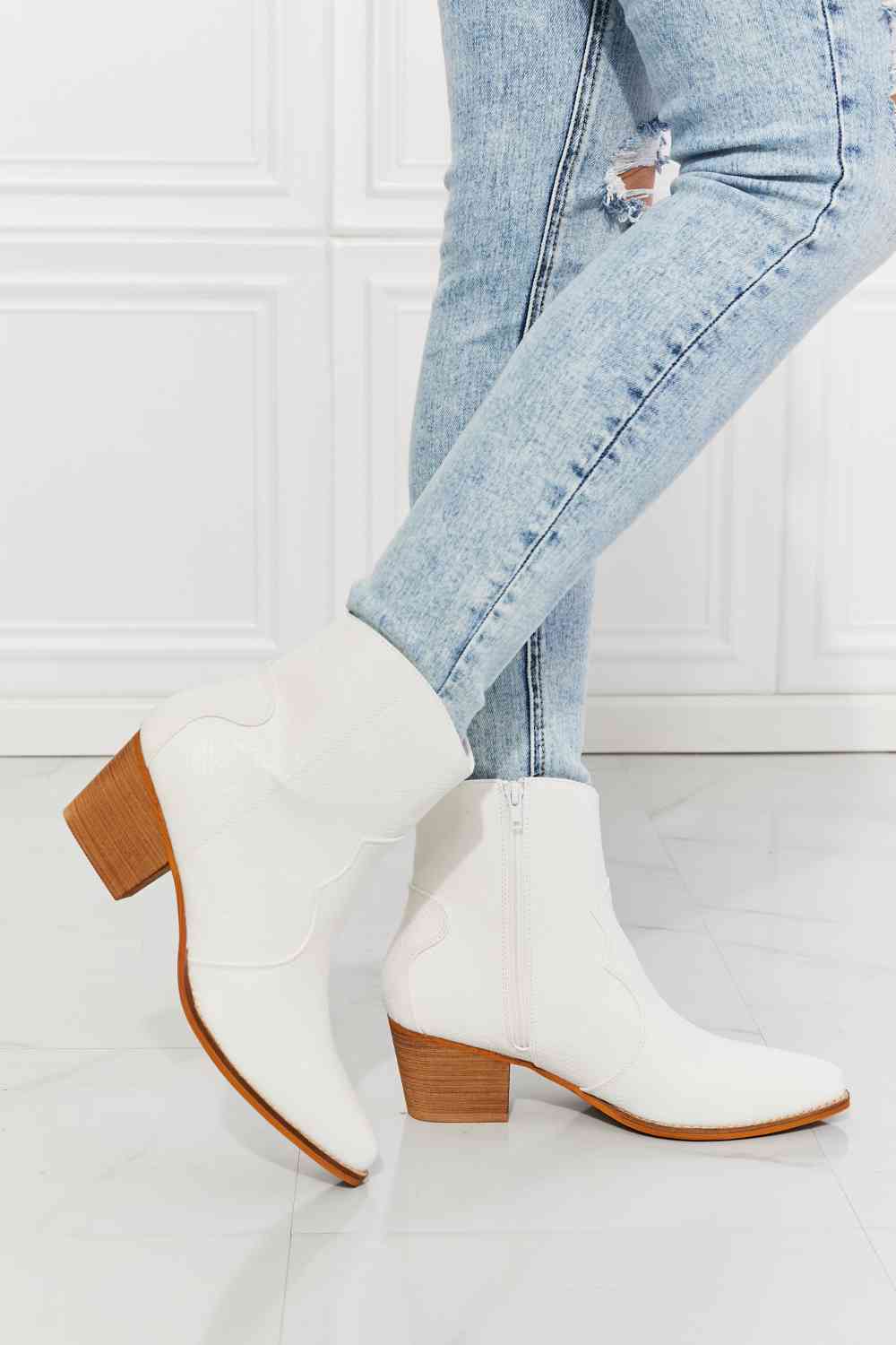 MMShoes Watertower Town Faux Leather Western Ankle Boots in WhiteThese Western-inspired booties feature a stacked heel and a faux leather upper. Their pointed toe adds a refined detail, making these a perfect choice to finish any chelsea boots womenchelsea boots women