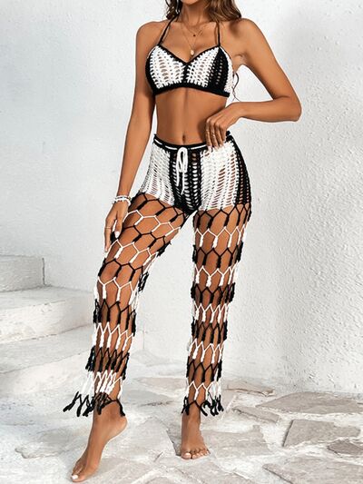 Cutout Halter Neck Top and Pants Two-Piece Swim SetFeatures: Cutout
Number of pieces: Two-piece
Chest pad: No padding
Underwire: No underwire
Stretch: Stretchy
Material composition: 100% acrylic
Care instructions: MaCutout Halter Neck TopCutout Halter Neck Top