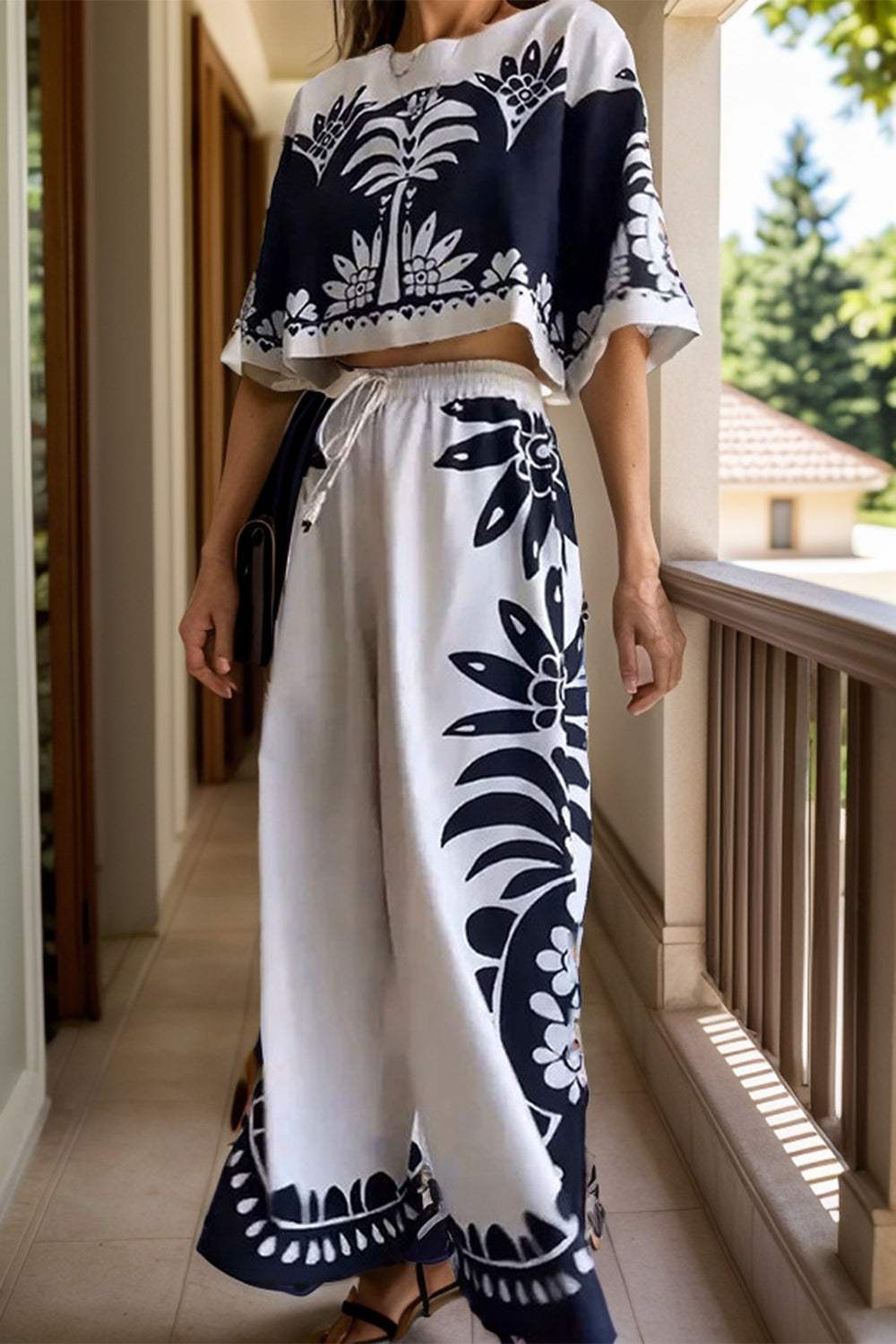 Printed Half Sleeve Top and Wide Leg Pants SetFeatures: Tied
Number of pieces: Two-piece
Stretch: No stretch
Material composition: 100% polyester
Care instructions: Machine wash cold. Tumble dry low.
Imported
PrPrinted Half Sleeve TopDressesPrinted Half Sleeve Top