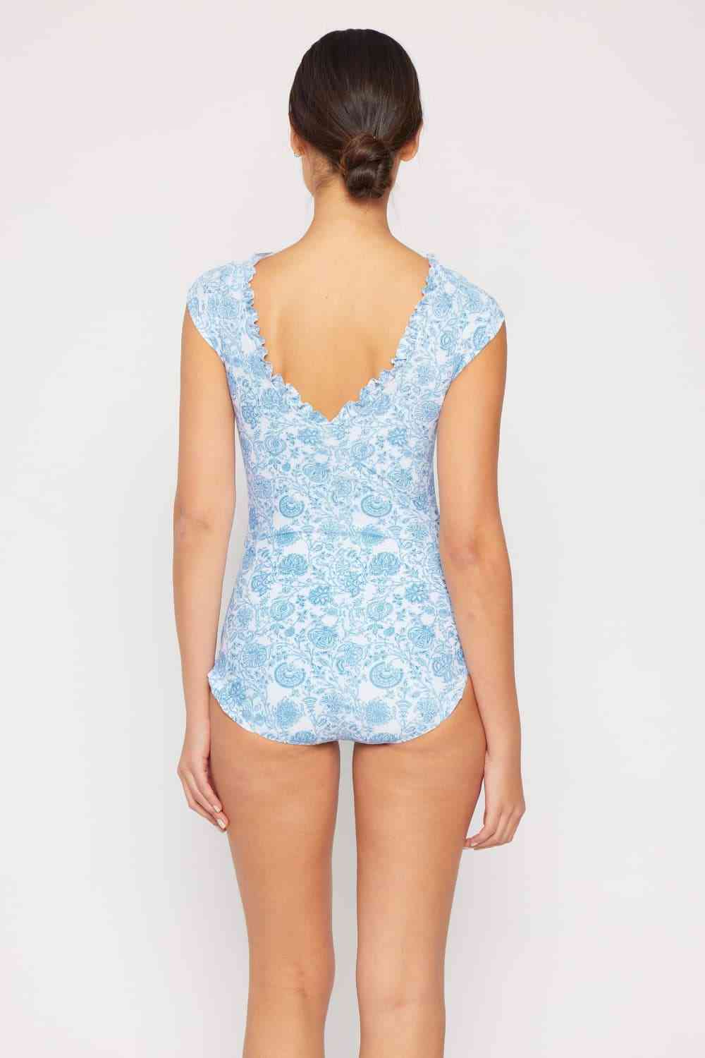 Marina West Swim Bring Me Flowers V-Neck One Piece Swimsuit In ThistleThis swimsuit is designed to make you feel like a true goddess of the sea, exuding style and sophistication with every step. The lace-up detail adds a touch of allurMarina West Swim BringMarina West Swim Bring