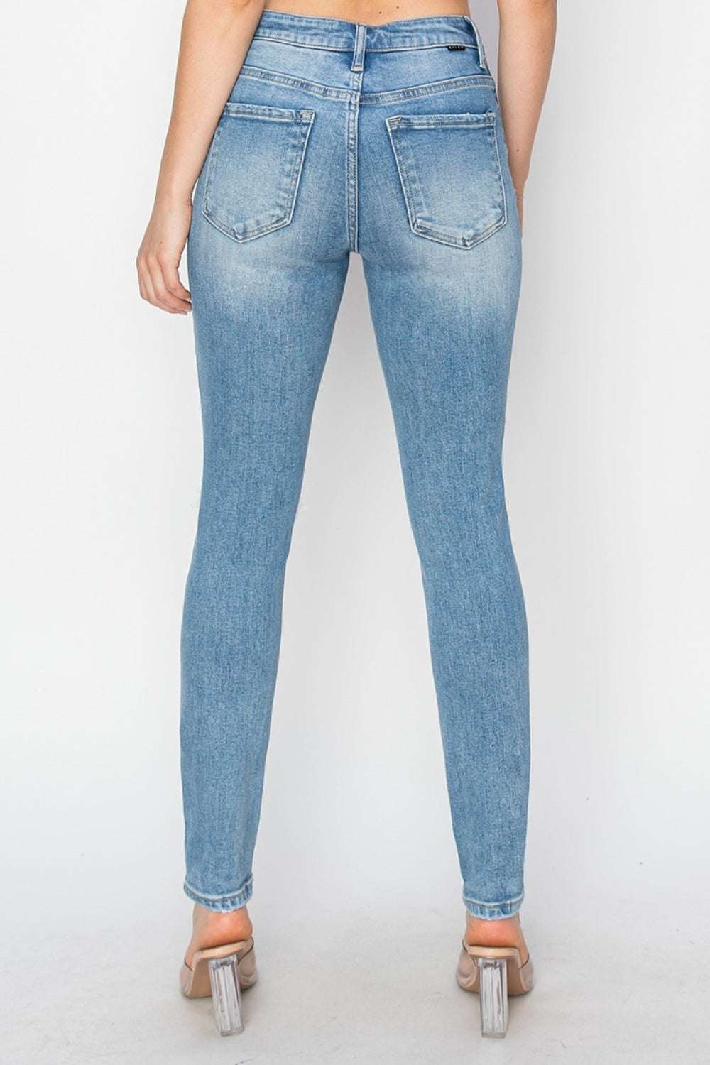 Risen Full Size High Rise Knee Distressed Skinny JeansThe High Rise Knee Distressed Skinny Jeans are a must-have for any fashion-forward wardrobe. Featuring a high-rise waist and skinny fit, these jeans offer a flatteriRisen Full Size High Rise Knee Distressed Skinny JeansRisen Full Size High Rise Knee Distressed Skinny Jeans