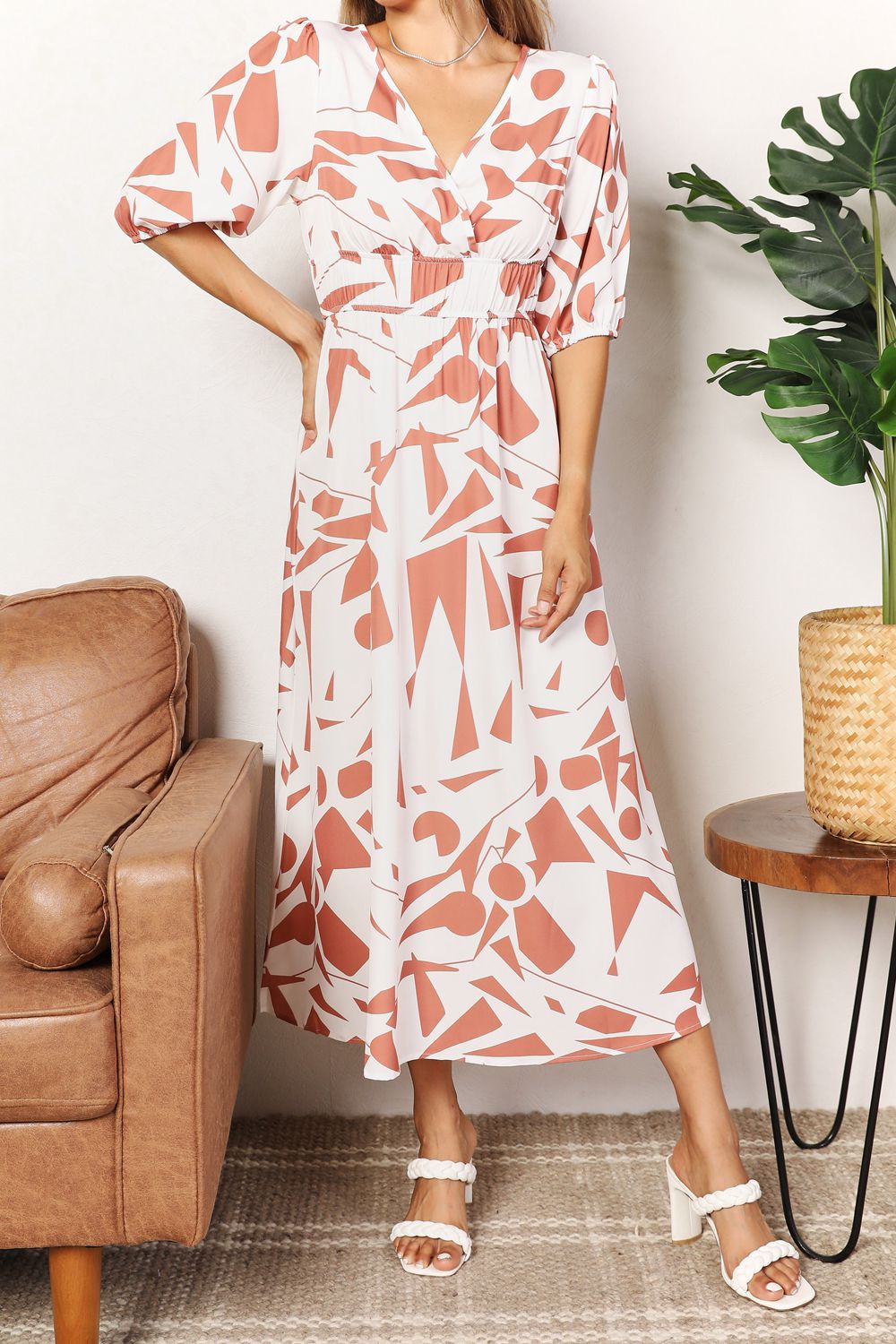 Printed Surplice Balloon Sleeve DressThis printed dress features a surplice neckline for an elegant and flattering look. The balloon sleeves add a touch of whimsy and playfulness to the dress. With its Printed Surplice Balloon Sleeve DressDressesPrinted Surplice Balloon Sleeve Dress