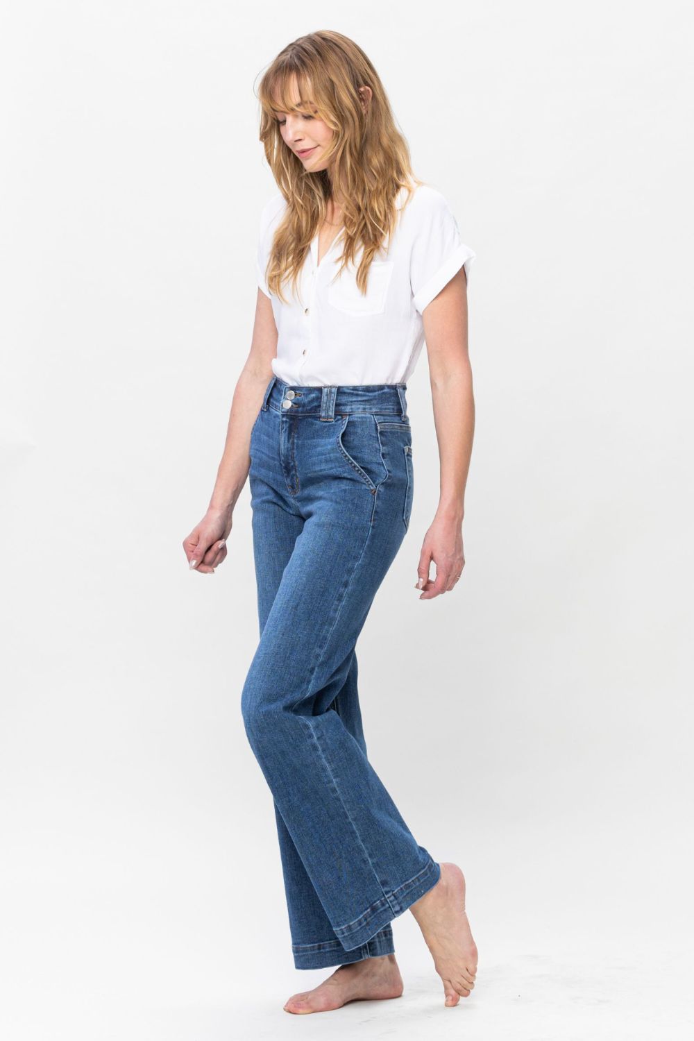 Judy Blue Full Size Double Button Wide Leg JeansHigh Rise Double button wide leg jeans are stylish wide leg jeans with a unique design and two buttons to add personality. Its loose pant leg cut, is comfortable andJudy Blue Full Size Double Button Wide Leg JeansJudy Blue Full Size Double Button Wide Leg Jeans