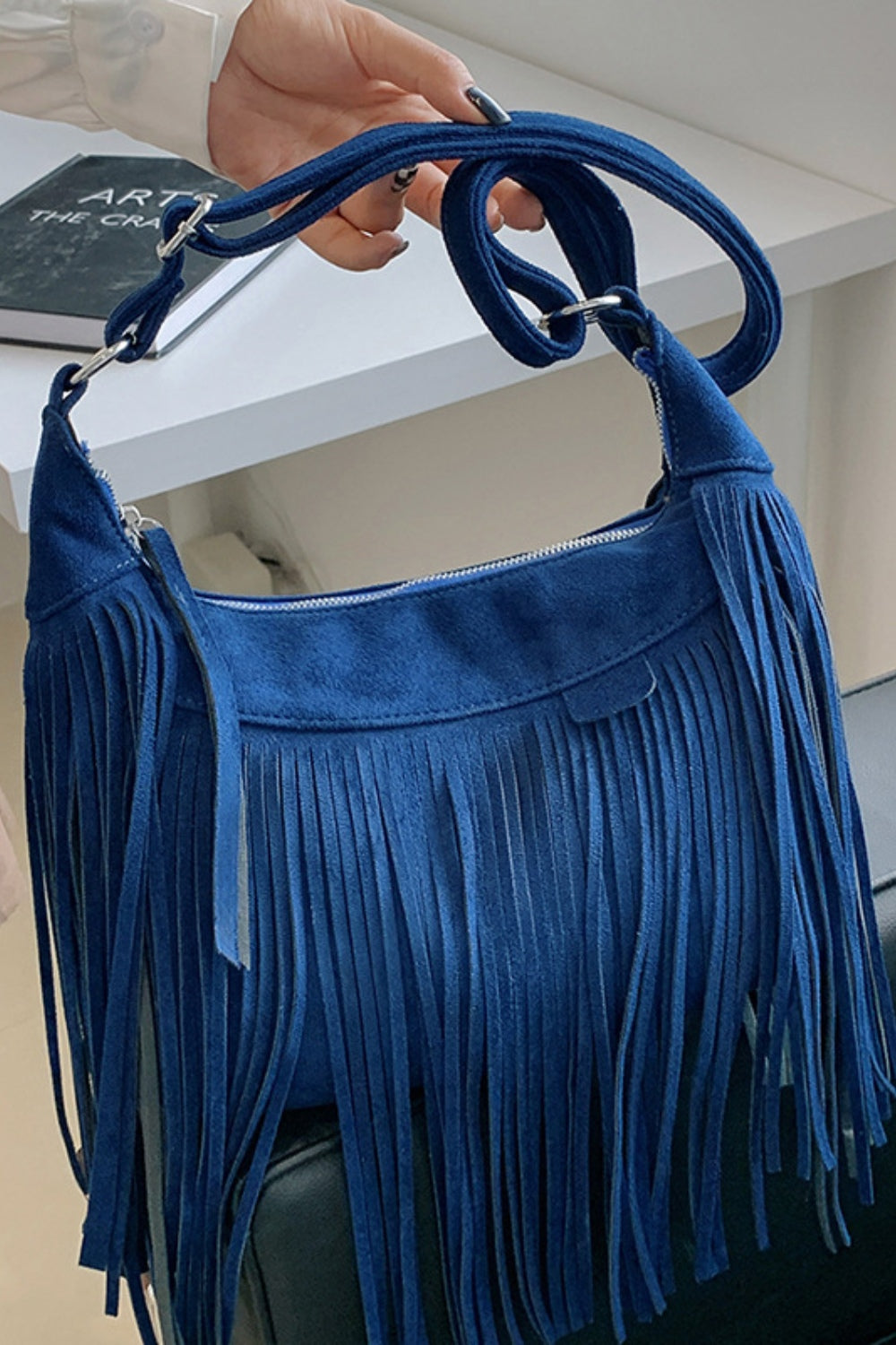 Suede Fringe Adjustable Strap Shoulder BagBag size: Small
Material: Suede
Imported
Product measurements:
Length 9.8 in, Width 3.1 in, Height 7.1 in, Weight 15.9 ozbag strapbag strap