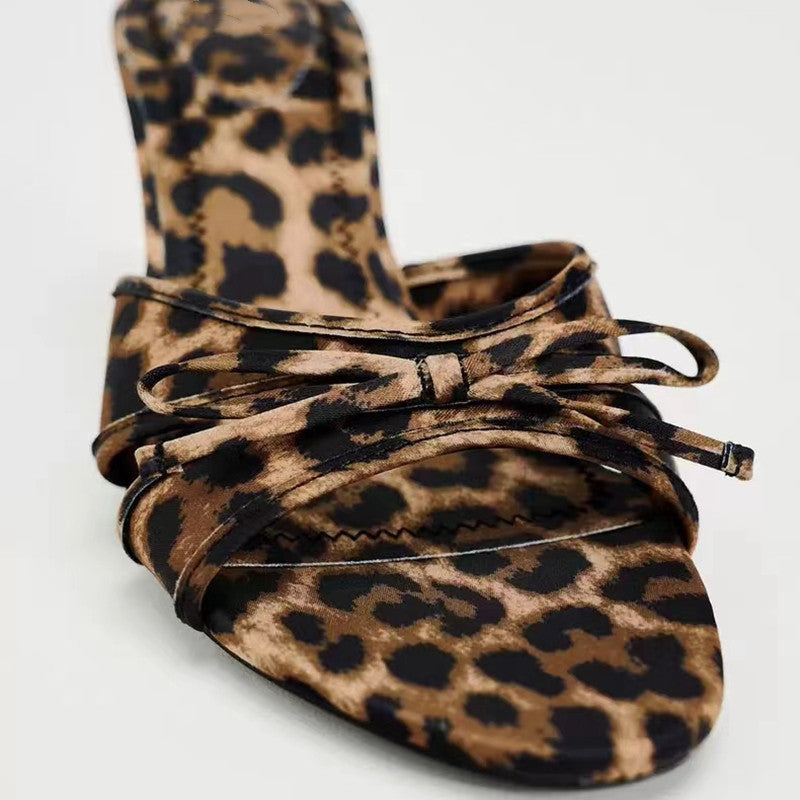 Bow Leopard Kitten Heel SandalsHeel height: Mid heels
Material: Elastomer, Pu
Imported
Product Measurements (Measurements by inches) &amp; Size Conversion

Size
Foot length


35(US4)
8.8


36(US5)Bow Leopard Kitten Heel SandalsShoesBow Leopard Kitten Heel Sandals