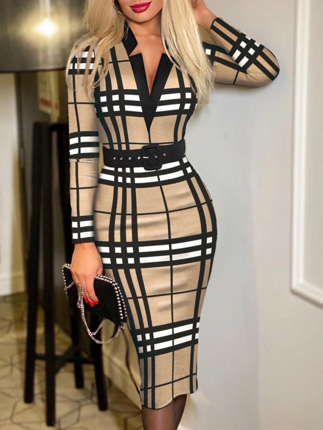 Printed Notched Long Sleeve Wrap DressFeatures: Basic style
Includes: Belted
Sheer: Opaque
Stretch: No stretch
Body: Not lined
Material composition: 100% polyester
Care instructions: Machine wash cold. TPrinted Notched Long Sleeve Wrap DressPrinted Notched Long Sleeve Wrap Dress