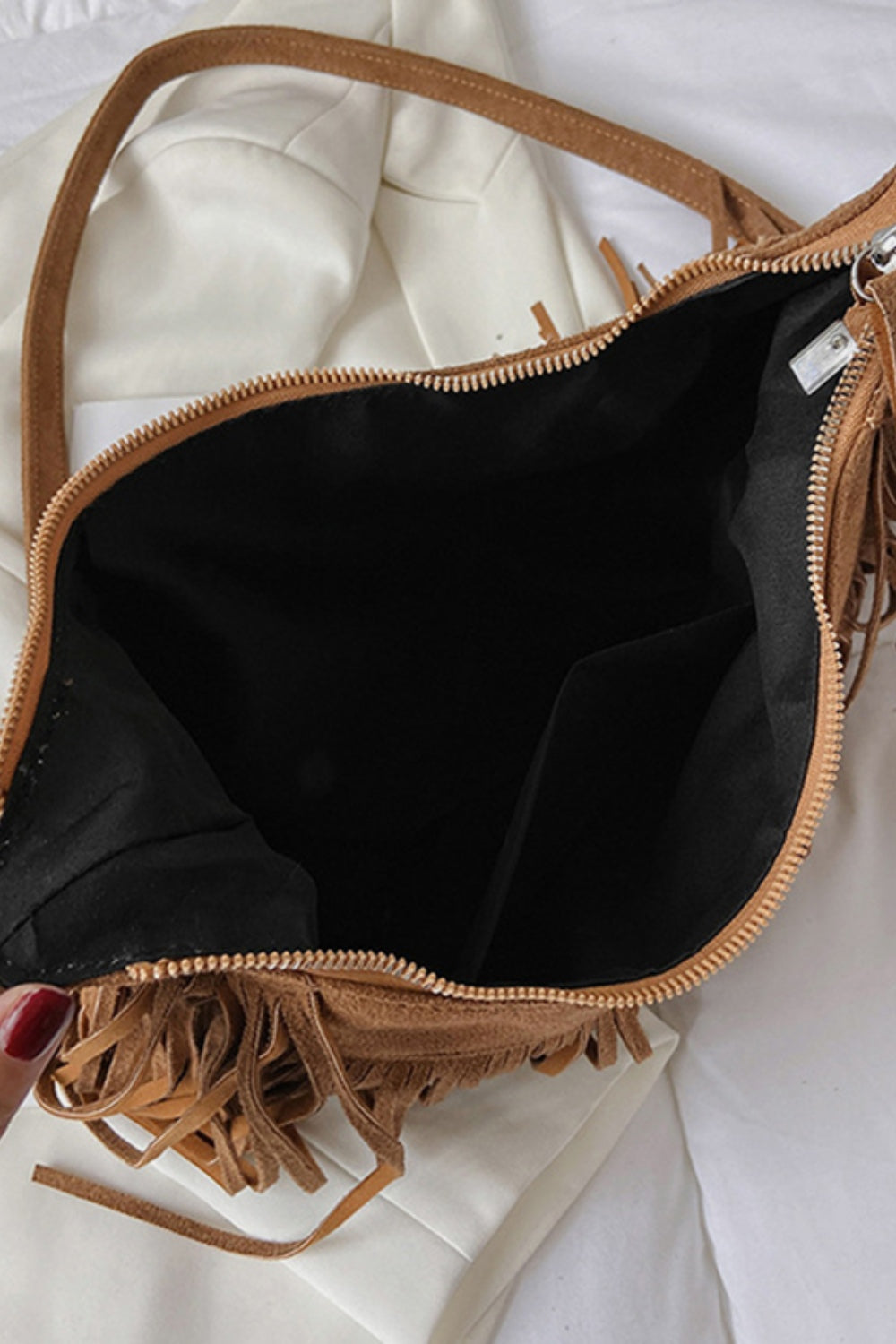 Suede Fringe Adjustable Strap Shoulder BagBag size: Small
Material: Suede
Imported
Product measurements:
Length 9.8 in, Width 3.1 in, Height 7.1 in, Weight 15.9 ozbag strapbag strap