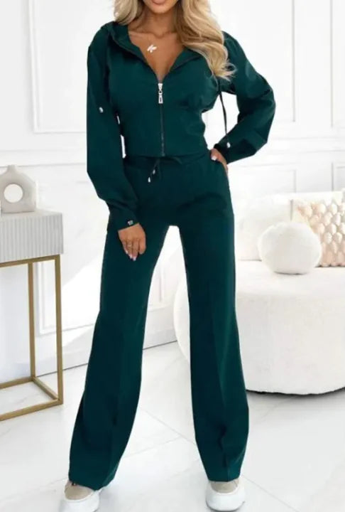 Hooded Zipper Jacket with Tight-Fitting Bottom SetThis stylish two-piece set combines a cozy hooded zipper jacket with tight-fitting pants, perfect for chilly fall and winter weather. The solid color design offers aHooded Zipper JacketPantsHooded Zipper Jacket