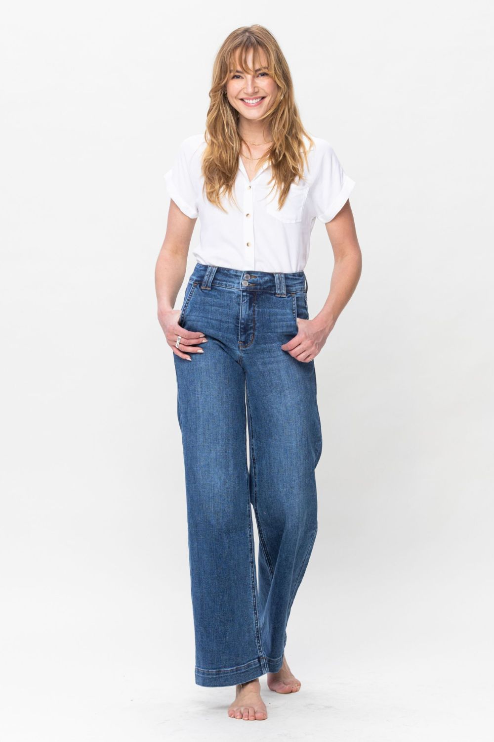 Judy Blue Full Size Double Button Wide Leg JeansHigh Rise Double button wide leg jeans are stylish wide leg jeans with a unique design and two buttons to add personality. Its loose pant leg cut, is comfortable andJudy Blue Full Size Double Button Wide Leg JeansJudy Blue Full Size Double Button Wide Leg Jeans