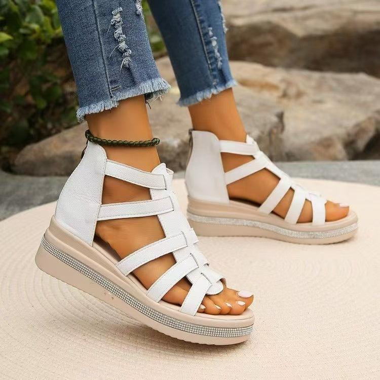 Cutout Rhinestone Trim Wedge SandalsAdd a touch of glamour to your look with these Cutout Rhinestone Trim Wedge Sandals. Featuring elegant cutout details and sparkling rhinestone accents, these wedge sCutout Rhinestone Trim Wedge SandalsCutout Rhinestone Trim Wedge Sandals