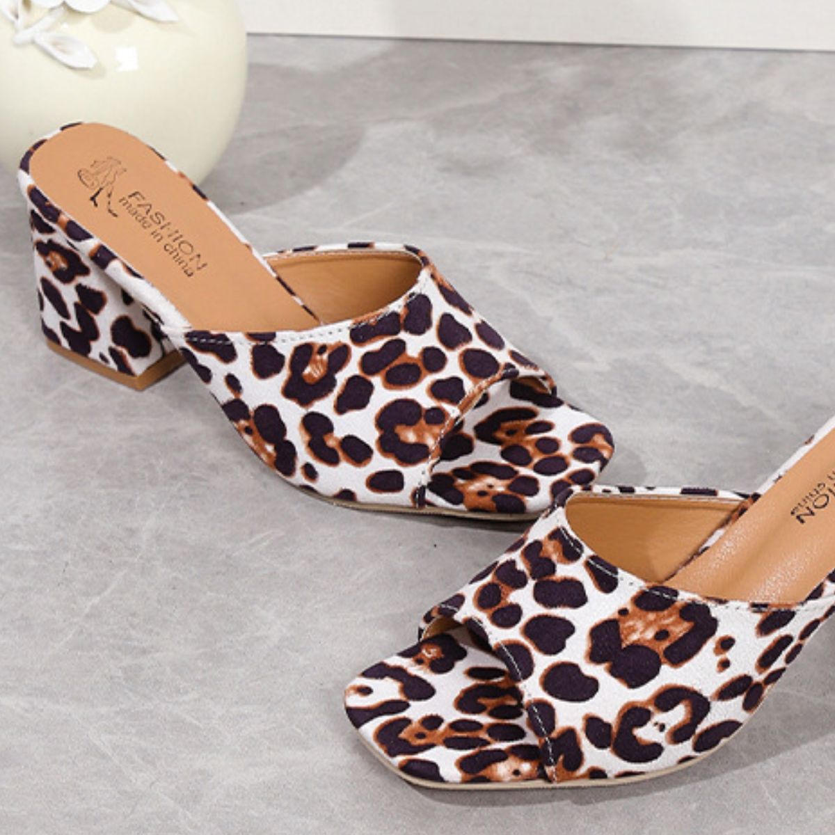 Leopard Block Heel Suede SandalsAdd a touch of sophistication to your style with these Leopard Block Heel Suede Sandals. Featuring a chic leopard print and soft suede finish, these block heel sandaLeopard Block Heel Suede SandalsShoesLeopard Block Heel Suede Sandals