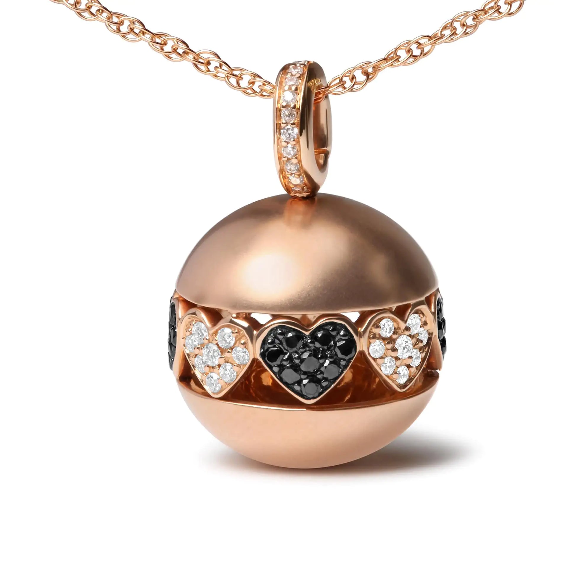 18K Rose Gold Black & White Diamond Ball Filigree Heart Pendant NecklaCast in polished 18k rose gold, this ball drop pendant necklace showcases a design that is rich in symbolism. A single row of diamond-encrusted filigree heart silhou18K Rose Gold Black & White Diamond Ball Filigree Heart Pendant NecklaceNecklaces18K Rose Gold Black & White Diamond Ball Filigree Heart Pendant Necklace