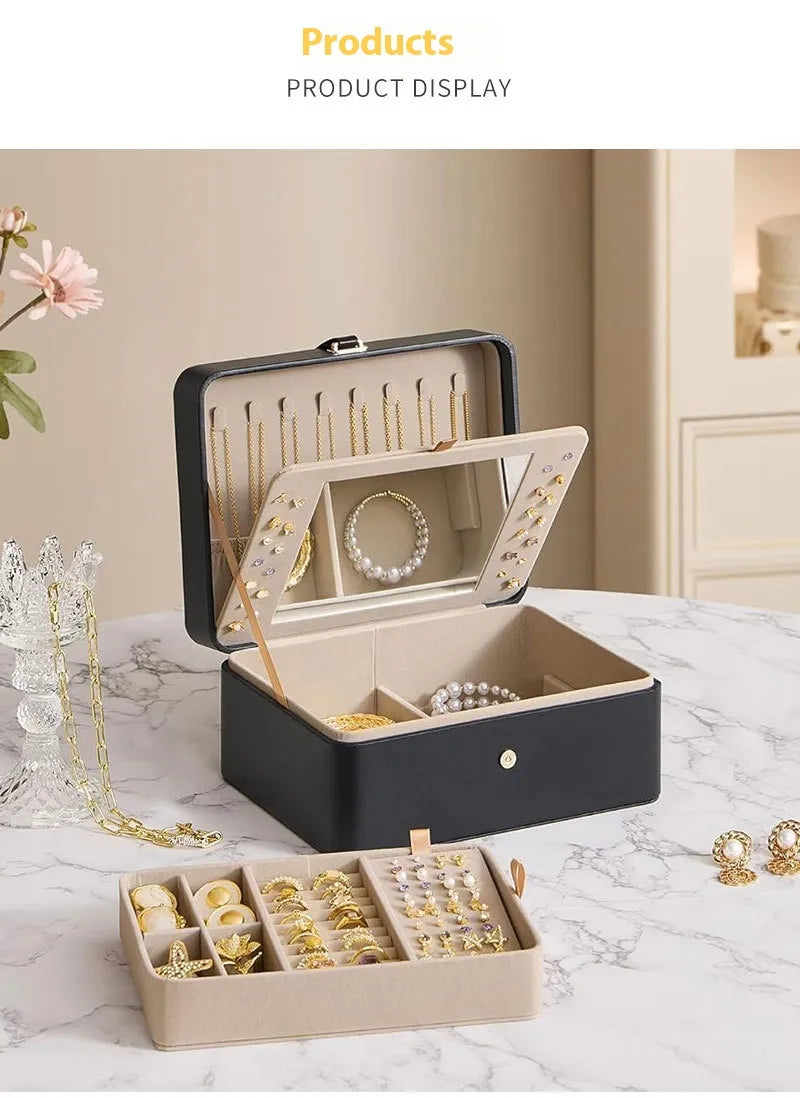 Clamshell Large Capacity Jewelry Box With Sandwich MirrorOrganize and Shine with the Clamshell Large Capacity Jewelry Box with Sandwich Mirror

Keep your jewelry collection beautifully organized and easily accessible with Clamshell Large Capacity Jewelry BoxJewelry BoxClamshell Large Capacity Jewelry Box