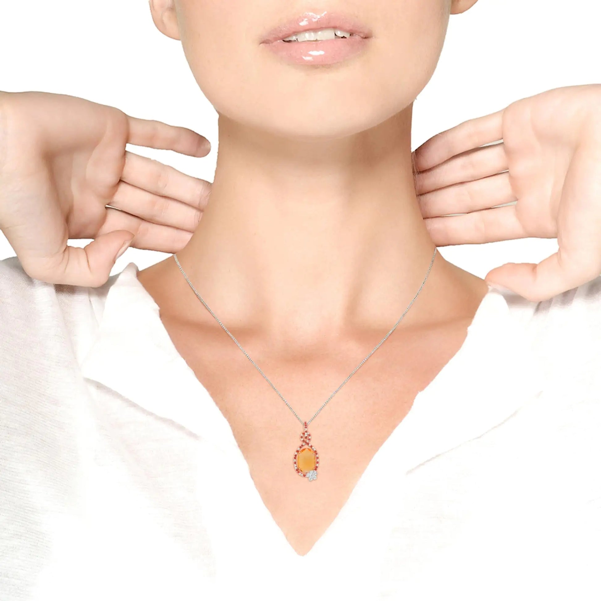 18K Rose Gold 1/5 Cttw Diamond and Oval Yellow Citrine and Round OrangIn a halo teardrop motif of genuine 18k rose gold, this pendant necklace makes an awe-inspiring impression comprised of natural gemstones and diamonds. At the center18K Rose Gold 15 Cttw Diamond18K Rose Gold 15 Cttw Diamond