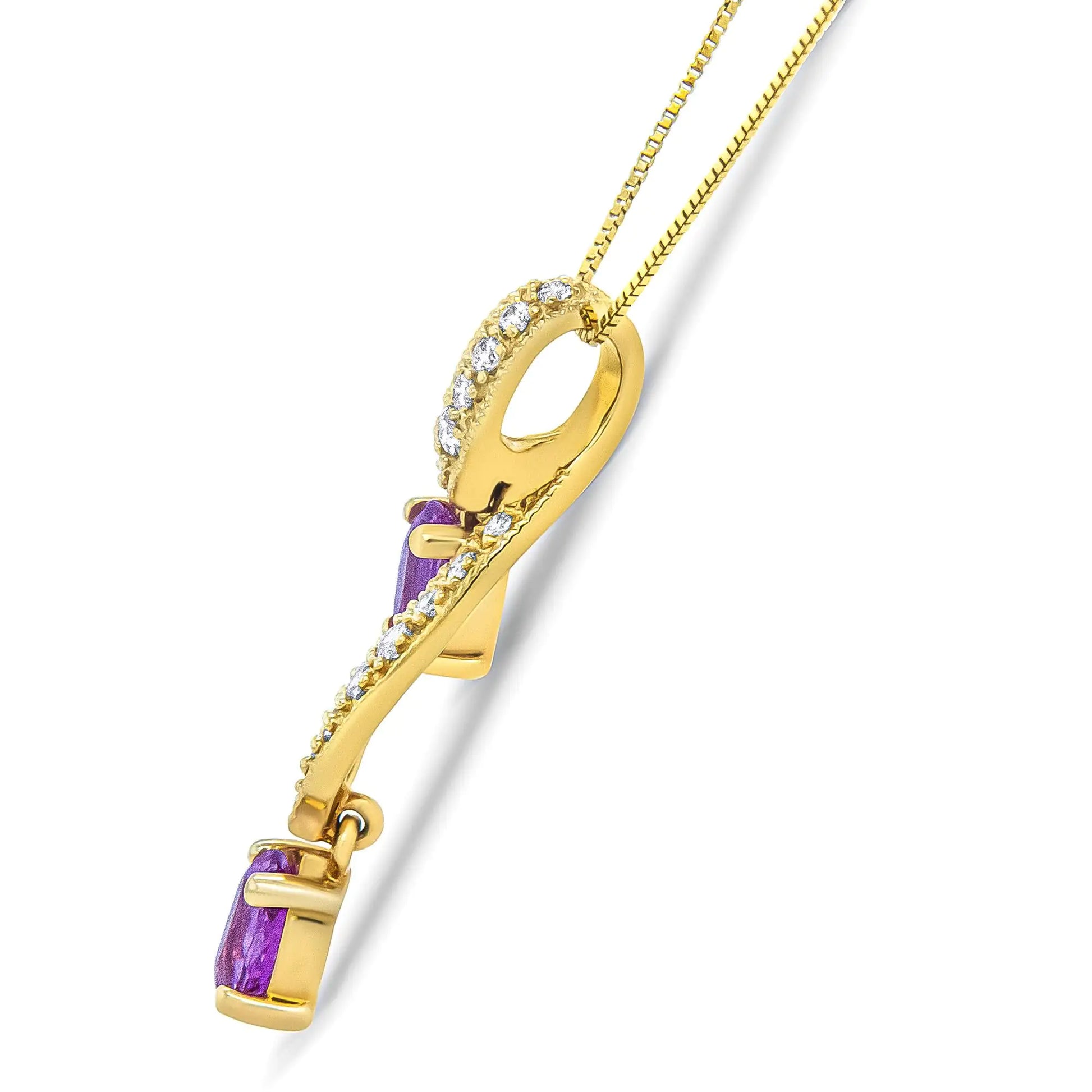 14K Yellow Gold 6x4mm Oval Pink Sapphire and 1/5 Cttw Round Diamond PeThis unique pendant necklace is sure to turn heads. The pendant features a a ribbon of diamond accented 14K Yellow Gold weaving through down neckline. The diamond st14K Yellow Gold 6x4mm Oval Pink Sapphire14K Yellow Gold 6x4mm Oval Pink Sapphire