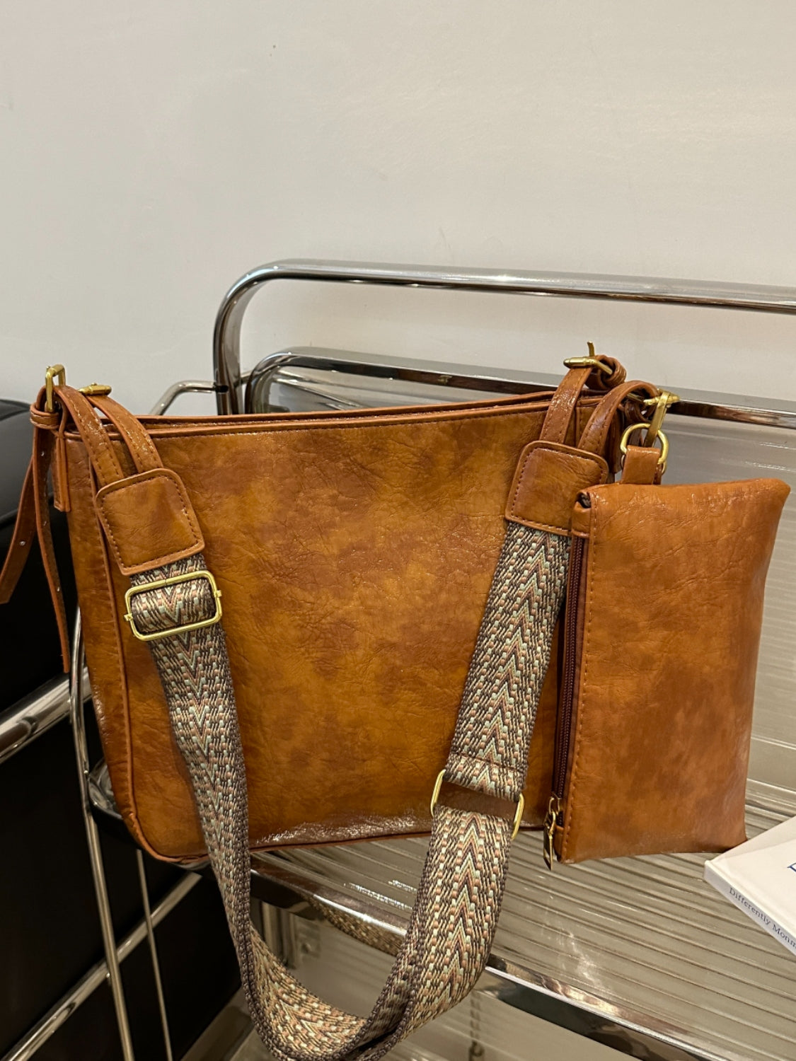 PU Leather Adjustable Strap Crossbody Bag with PouchBag size: Medium
Material: PU leather
Imported
Product Measurements (Measurements by inches) &amp; Size Conversion

Size
Actual Length
Actual Width
Actual Height


OPU Leather Adjustable Strap Crossbody BagPU Leather Adjustable Strap Crossbody Bag