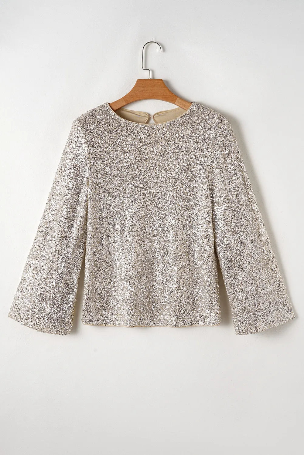 Cutout Sequin Round Neck Long Sleeve BlouseFeatures: Cutout, Sequin
Sheer: Opaque
Stretch: Slightly stretchy
Material composition: 95% polyester, 5% elastane
Care instructions: Machine wash cold. Tumble dry lCutout Sequin Round Neck Long Sleeve BlouseCutout Sequin Round Neck Long Sleeve Blouse