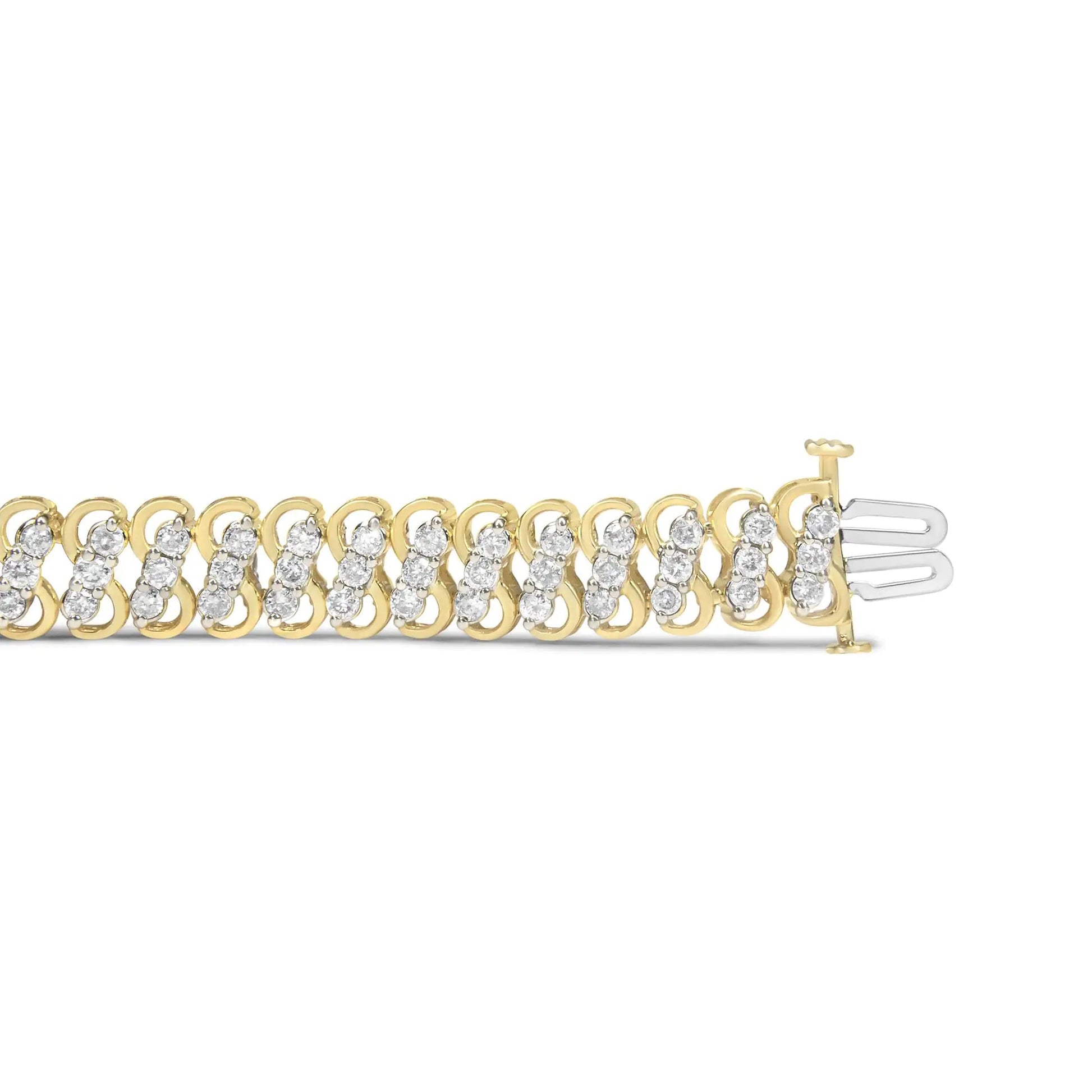 10K Yellow Gold Triple-Row Diamond Tennis Bracelet – 4.00 CaratsDazzle with this 10K Yellow Gold Triple-Row Diamond Tennis Bracelet, showcasing 4.00 carats of radiant diamonds arranged in a luxurious three-row design. The brillia10K Yellow Gold Triple-Row Diamond Tennis Bracelet – 4Bracelet10K Yellow Gold Triple-Row Diamond Tennis Bracelet – 4