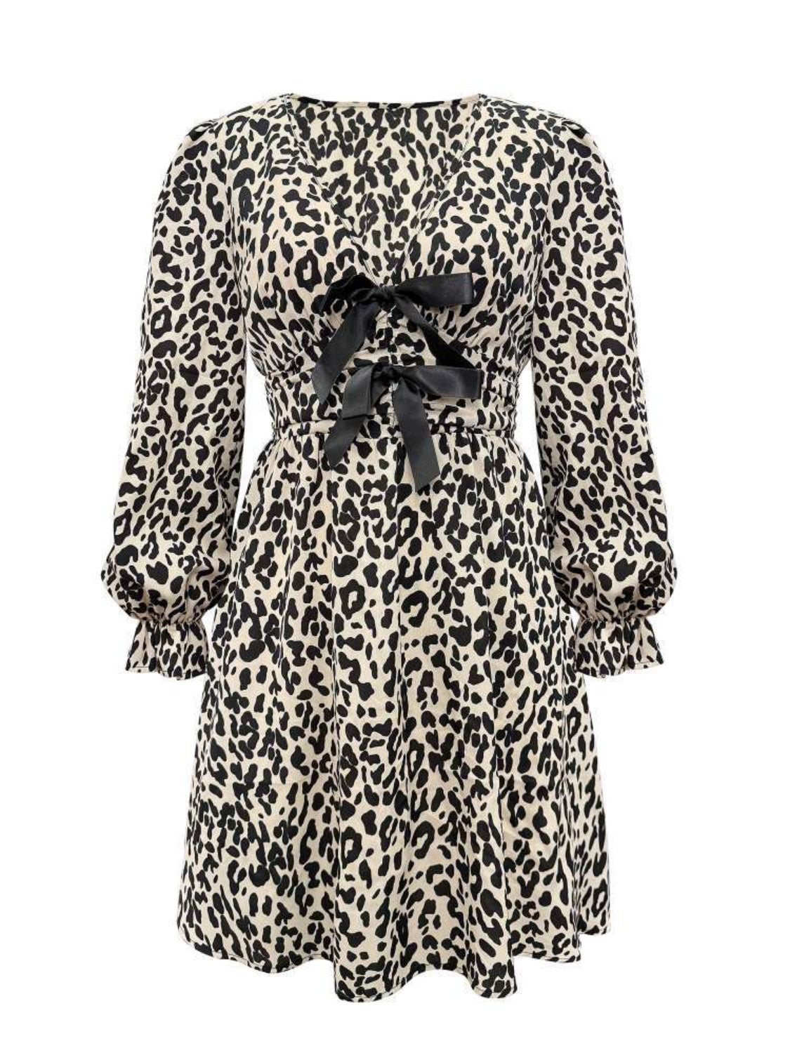 Leopard V-Neck Flounce Sleeve DressIndulge in the art of luxury with our Leopard V-Neck Flounce Sleeve Dress. The striking leopard print and chic V-neck design make this dress both sophisticated and d-Neck Flounce Sleeve DressDresses-Neck Flounce Sleeve Dress