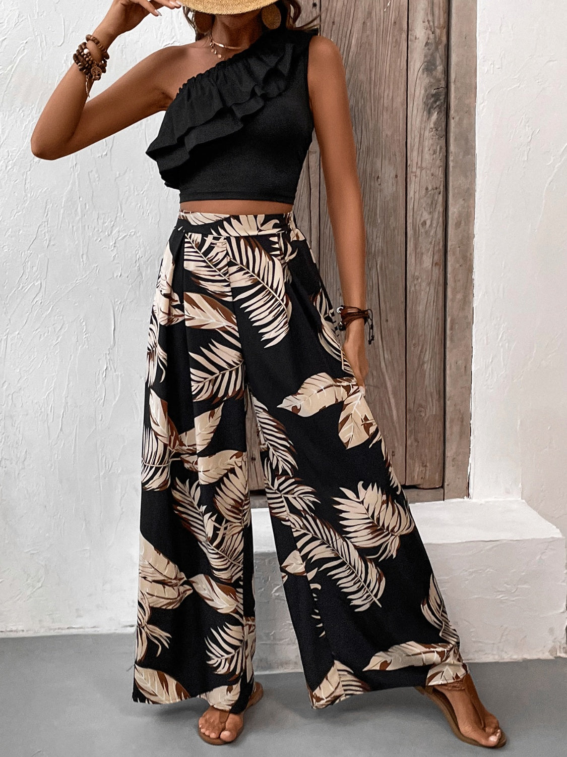 Honey Ruffled Sleeveless Top and Printed Pants SetFeatures: Ruffled
Number of pieces: Two-piece
Stretch: No stretch
Material composition: 95% polyester, 5% elastane
Care instructions: Machine wash cold. Tumble dry lHoney Ruffled Sleeveless TopDressesHoney Ruffled Sleeveless Top