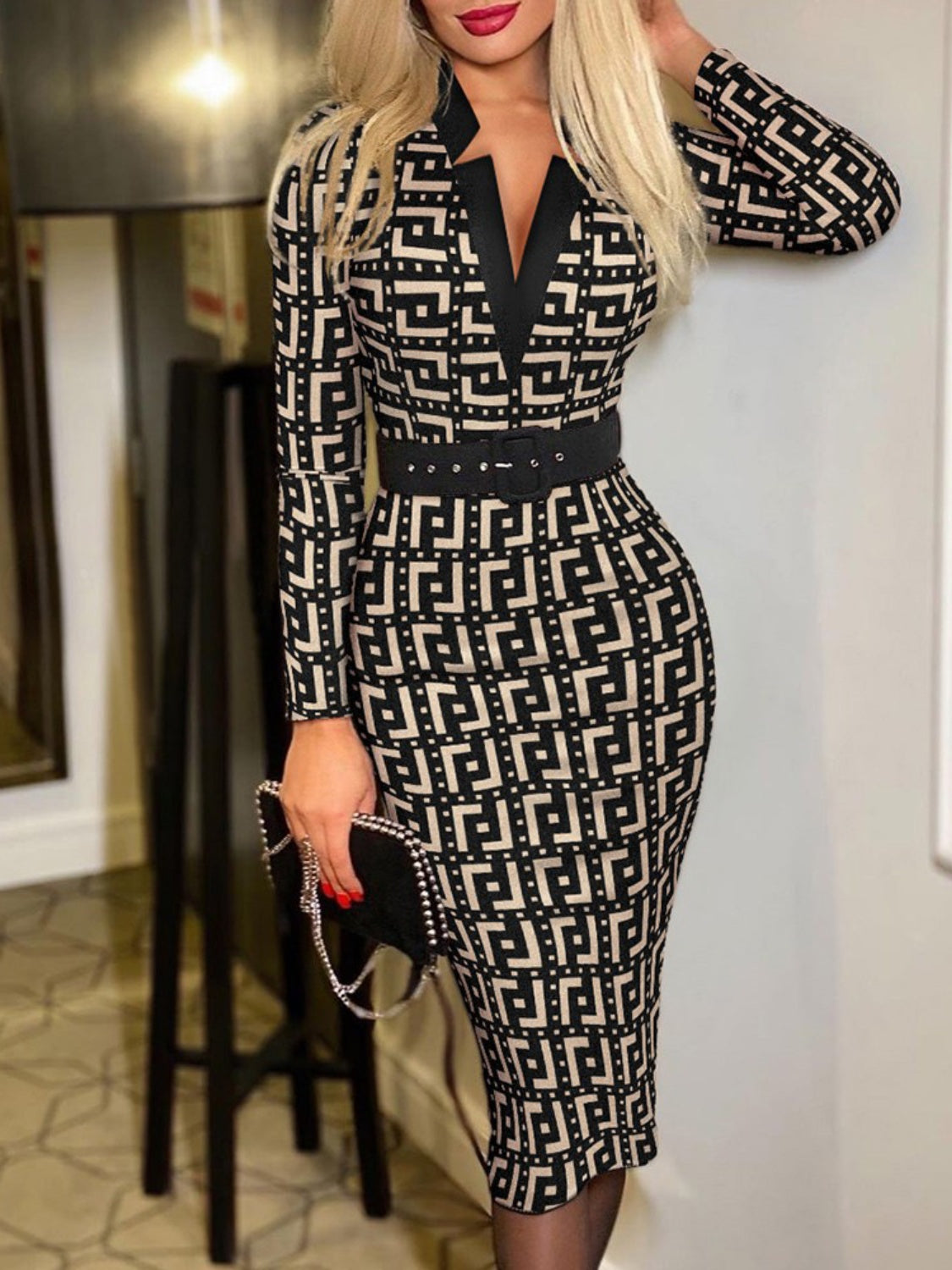 Printed Notched Long Sleeve Wrap DressFeatures: Basic style
Includes: Belted
Sheer: Opaque
Stretch: No stretch
Body: Not lined
Material composition: 100% polyester
Care instructions: Machine wash cold. TPrinted Notched Long Sleeve Wrap DressPrinted Notched Long Sleeve Wrap Dress