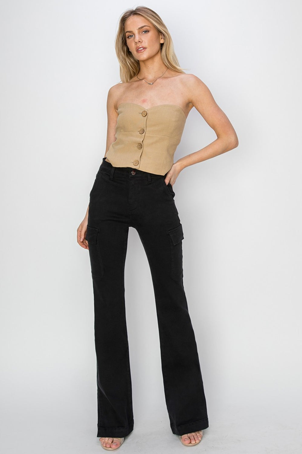 RISEN Full Size High Rise Side Slit Cargo Bootcut JeansElevate your denim game with these high-rise side slit cargo bootcut jeans. The unique design features a flattering high waist and a trendy bootcut leg silhouette. TRISEN Full Size High Rise Side Slit Cargo Bootcut JeansRISEN Full Size High Rise Side Slit Cargo Bootcut Jeans