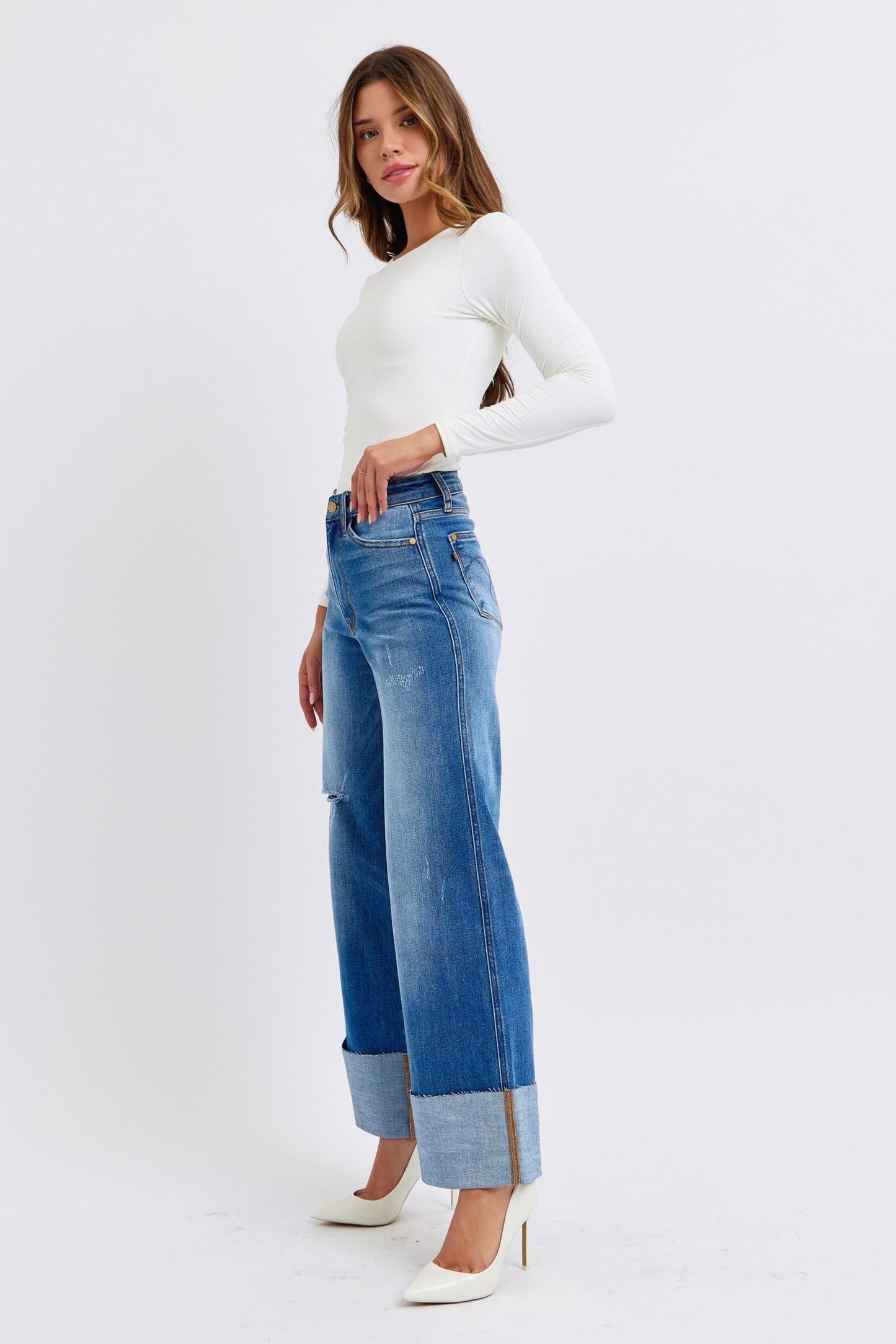 Judy Blue Full Size Distressed High Waist Wide Leg JeansThe Distressed High Waist Wide Leg Jeans are a stylish and on-trend choice for adding a touch of edge to your denim collection. The high waist design offers a flatteJudy Blue Full Size Distressed High Waist Wide Leg JeansJudy Blue Full Size Distressed High Waist Wide Leg Jeans