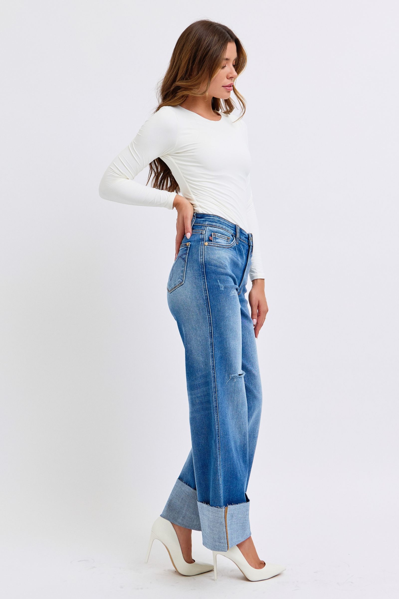 Judy Blue Full Size Distressed High Waist Wide Leg JeansThe Distressed High Waist Wide Leg Jeans are a stylish and on-trend choice for adding a touch of edge to your denim collection. The high waist design offers a flatteJudy Blue Full Size Distressed High Waist Wide Leg JeansJudy Blue Full Size Distressed High Waist Wide Leg Jeans