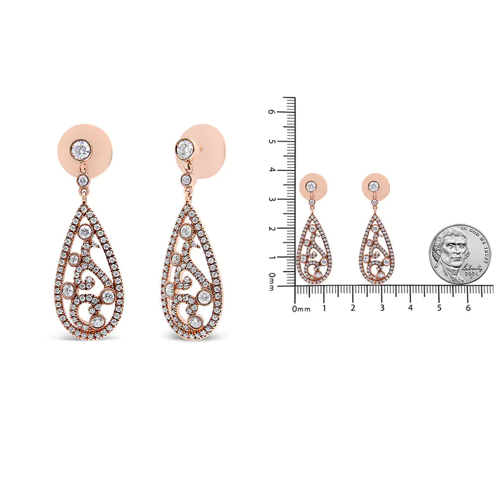 18K Rose Gold 1 1/4 Cttw Diamond Teardrop Shaped Drop and Dangle ScrewBring sparkle to your ear with these diamond drop earrings. Crafted from vibrant 18K rose gold, each teardrop-shaped dangle shimmers with an intricate diamond studde18K Rose Gold 1 14 Cttw Diamond Teardrop Shaped Drop18K Rose Gold 1 14 Cttw Diamond Teardrop Shaped Drop