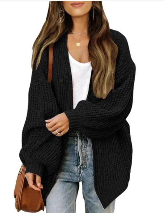 Loose Retro Sweater Coat Women's Mid-length Knitted CardiganCozy up in style with our Loose Retro Sweater Coat! Designed for modern women who love a touch of vintage flair, this mid-length knitted cardigan combines comfort anLoose Retro Sweater Coat Women'Loose Retro Sweater Coat Women'