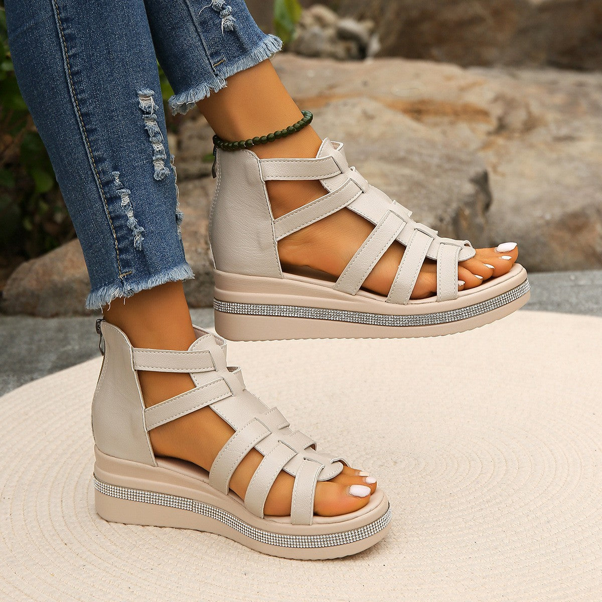 Cutout Rhinestone Trim Wedge SandalsAdd a touch of glamour to your look with these Cutout Rhinestone Trim Wedge Sandals. Featuring elegant cutout details and sparkling rhinestone accents, these wedge sCutout Rhinestone Trim Wedge SandalsCutout Rhinestone Trim Wedge Sandals