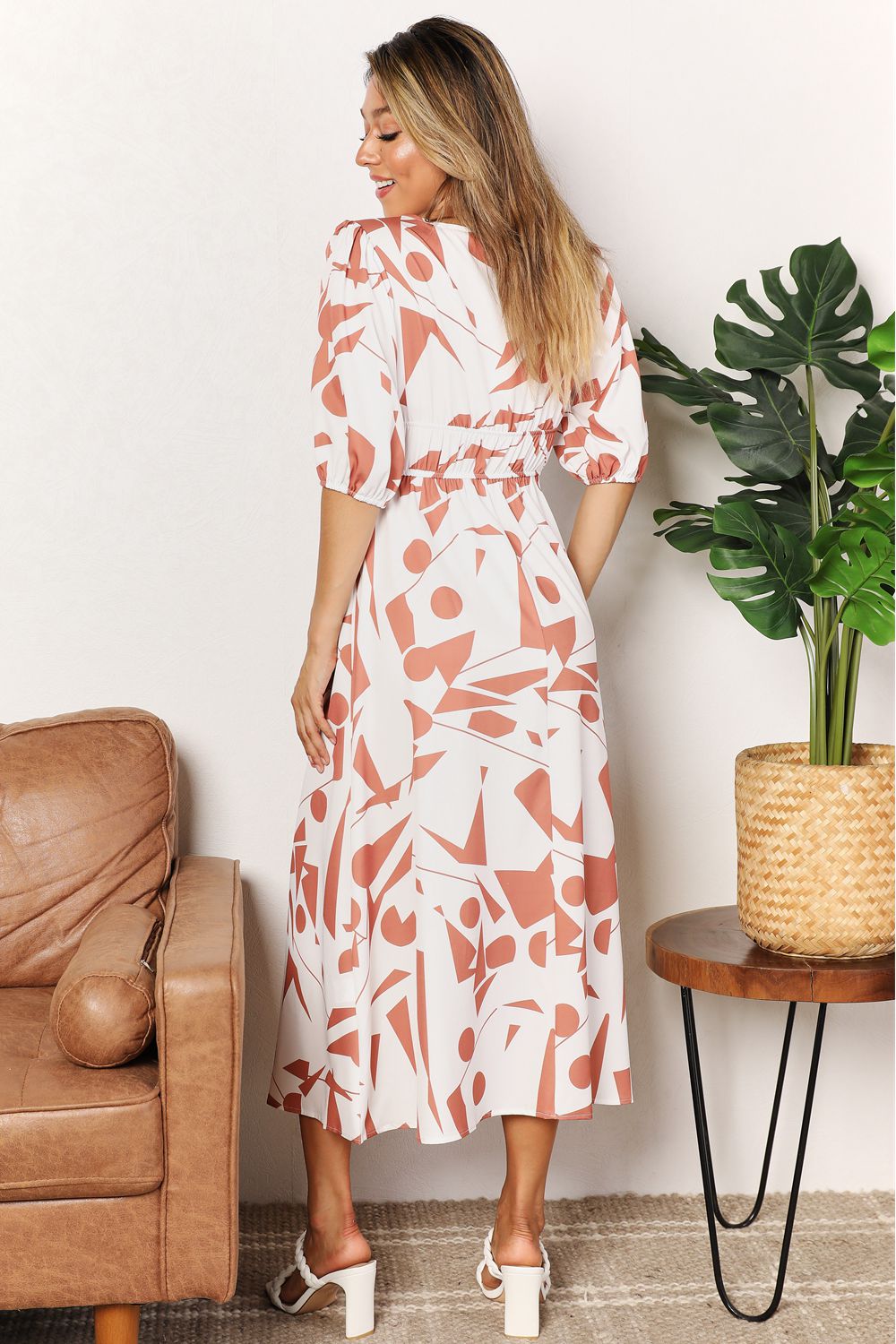 Printed Surplice Balloon Sleeve DressThis printed dress features a surplice neckline for an elegant and flattering look. The balloon sleeves add a touch of whimsy and playfulness to the dress. With its Printed Surplice Balloon Sleeve DressDressesPrinted Surplice Balloon Sleeve Dress