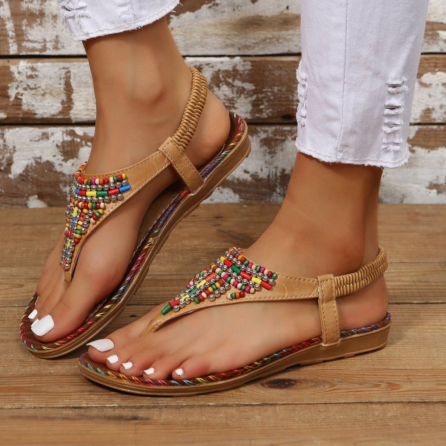 Beaded PU Leather Open Toe SandalsIncludes: Box not included
Heel height: Flats
Material: PU, Plastic
Imported
Product Measurements (Measurements by inches) &amp; Size Conversion

Size
Foot length


Beaded PU Leather Open Toe SandalsBeaded PU Leather Open Toe Sandals